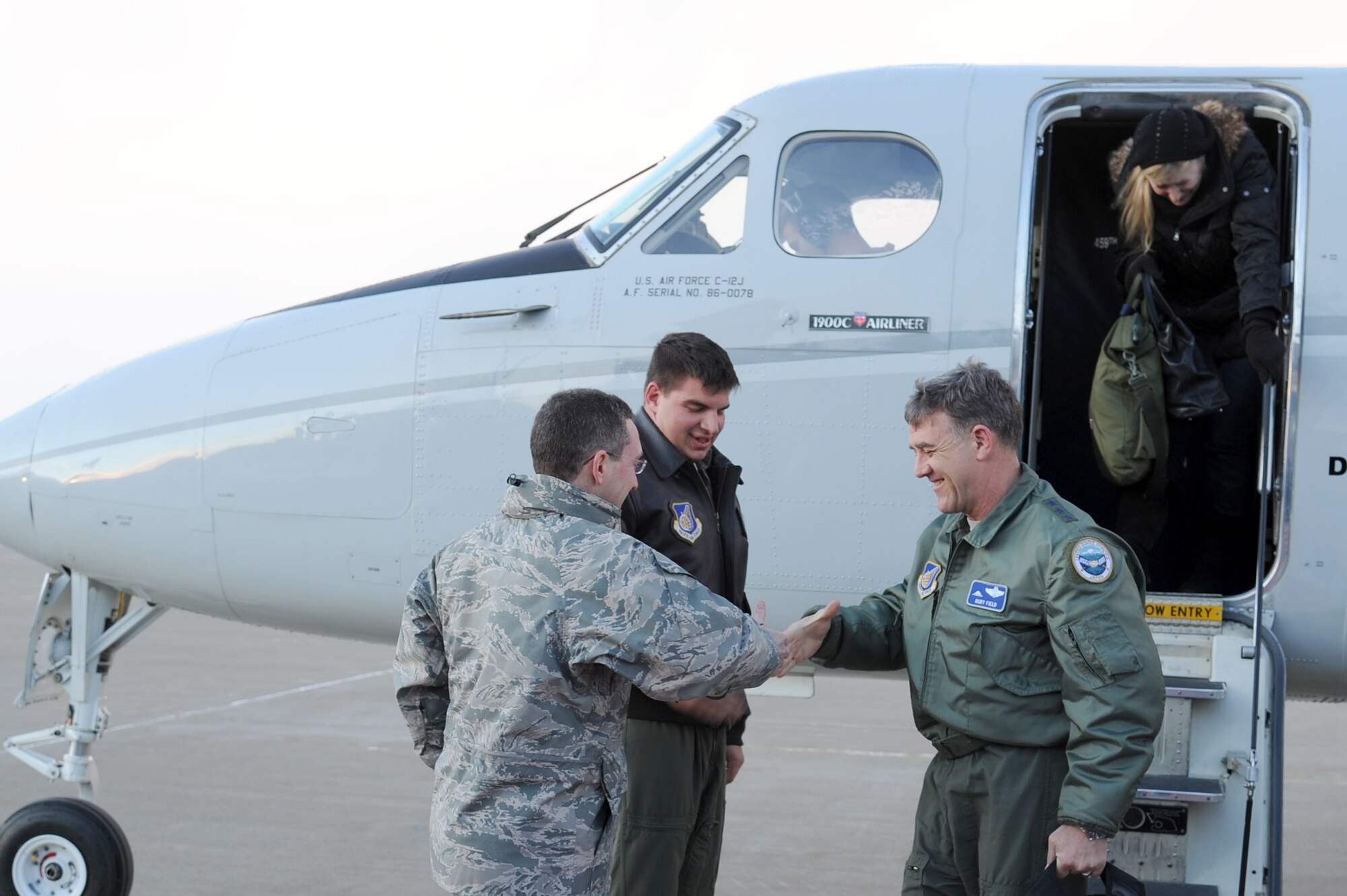 U.S. Air Force Col. Michael Rothstein, 35th Fighter Wing commander, greets Lt. Gen. Burton Field, 5th Air Force commander, upon his arrival at Misawa Air Base, Japan Feb. 16, 2012. Fifth Air Force leadership and their spouses traveled to Misawa AB to visit with Airmen and their dependents. (U.S. Air Force photo by Tech. Sgt. Marie Brown/Released)