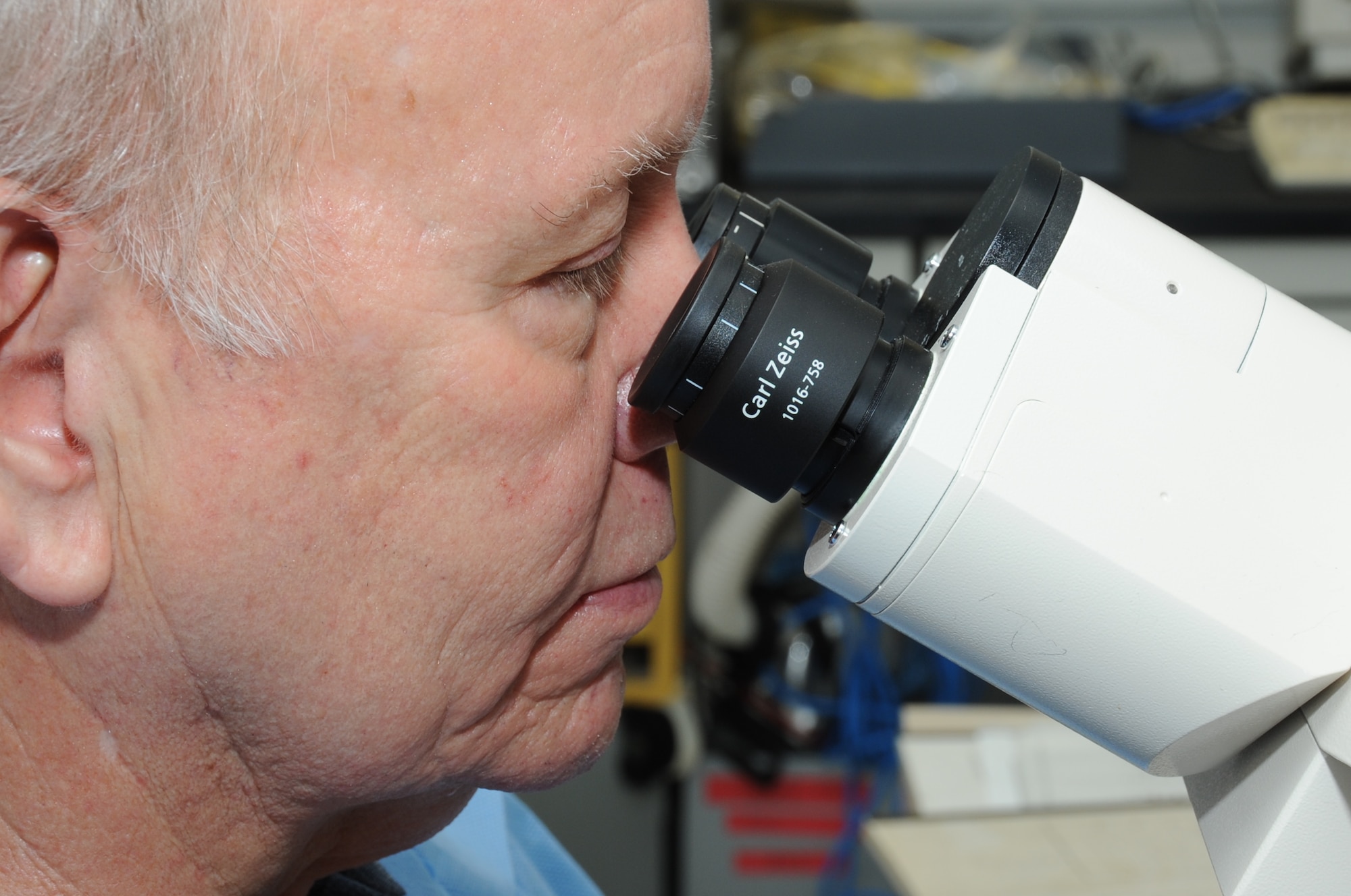 Chris Williams, 81st Medical Operations Squadron cytogenetics technologist, views metaphase under a microscope and logs his findings at the 81st Medical Group’s genetics center at Keesler Air Force Base, Miss., Feb. 17, 2012.  (U.S. Air Force photo by Kemberly Groue)