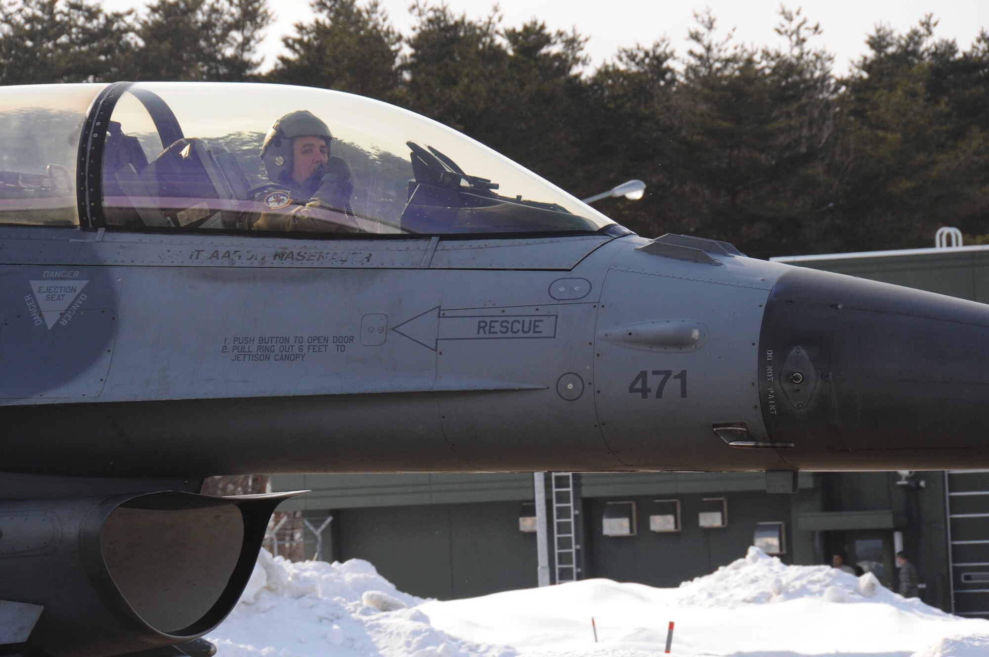 U.S. Air Force Lt. Gen. Burton Field, Fifth Air Force commander, taxis an F-16 Fighting Falcon aircraft after a flight at Misawa Air Base, Japan, Feb.17, 2012. Field is a command pilot with more than 3,400 flying hours in the F-16 and F-22 Raptor aircraft. (U.S. Air Force photo by Airman Kenna Jackson/Released)