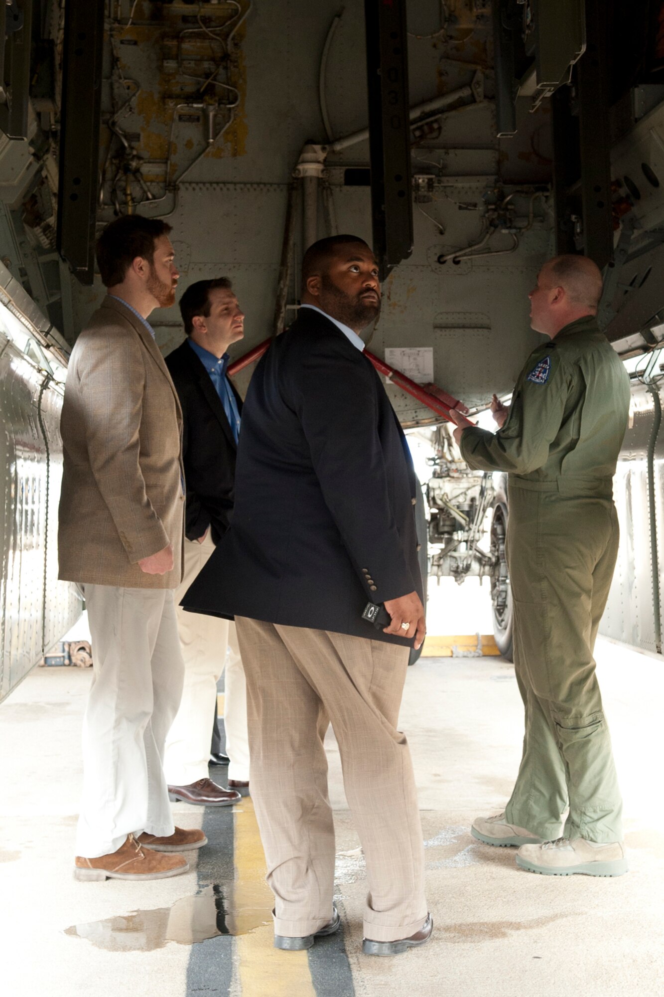 U.S. Air Force Capt. Andrew Riepe, 11th Bomb Squadron B-52 aircrew member, talks to Congressional Staff Delegates during a tour at Barksdale Air Force Base, La., Feb. 22, 2012. The delegates were given a tour of a B-52 with aircrew on hand to answer questions about the aircraft's capabilities. (U.S. Air Force photo by Master Sgt. Greg Steele/Released)