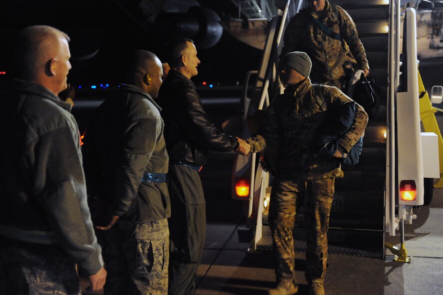 Base leadership welcome back Airmen from the 723d Aircraft Maintenance Squadron
at Moody Air Force Base, Ga., Feb. 22, 2012. The Airmen deployed to Afghanistan in support of Operation Enduring Freedom. (U.S. Air Force photo by Staff Sgt. Ciara Wymbs/Released) 
