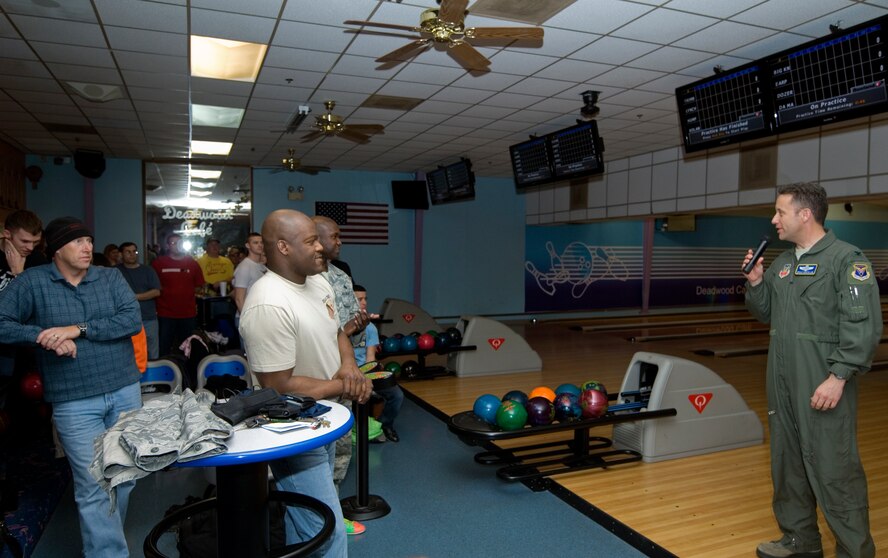 Col. Gerald Goodfellow, right, 7th Bomb Wing vice commander, speaks at the Dyess Bowling Alley to Airmen during the Dyess Bowl for Kids’ Sake Feb. 17, 2012 at Dyess Air Force Base, Texas. The Dyess Bowl for Kids’ Sake helps raise money for Big Brother Big Sister, a nonprofit organization that helps children reach their potential. (U.S. Air Force photo by Airman 1st Class Damon Kasberg/Released)