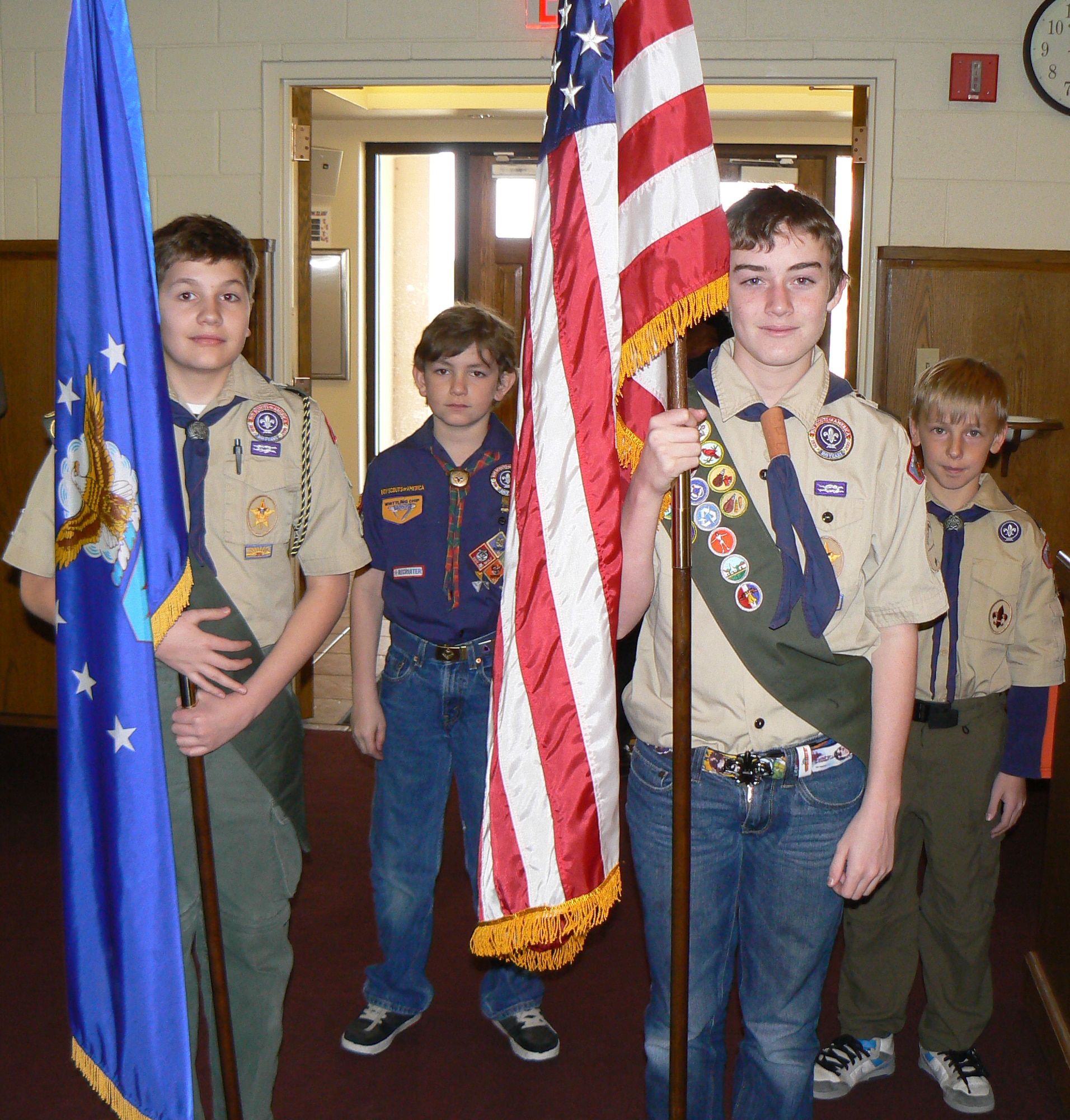 KIRTLAND AFB, N.M. -- ‘Scout Sunday’ is an annual event at the base chapel on the first Sunday in February, when scouts participate in a worship service and are presented their ‘God and Country Medals.’ On Feb. 5, Chris Robison (front row, left) and Jacob Mansberger (front row, right), of Kirtland AFB Boy Scout Troop 85, along with Evan Karmann, of Cub Scout Pack 85 (back row, left) and Thaddeus Krueger (back row, right), also of Troop 85, posted the colors. (Courtesy photo.) 