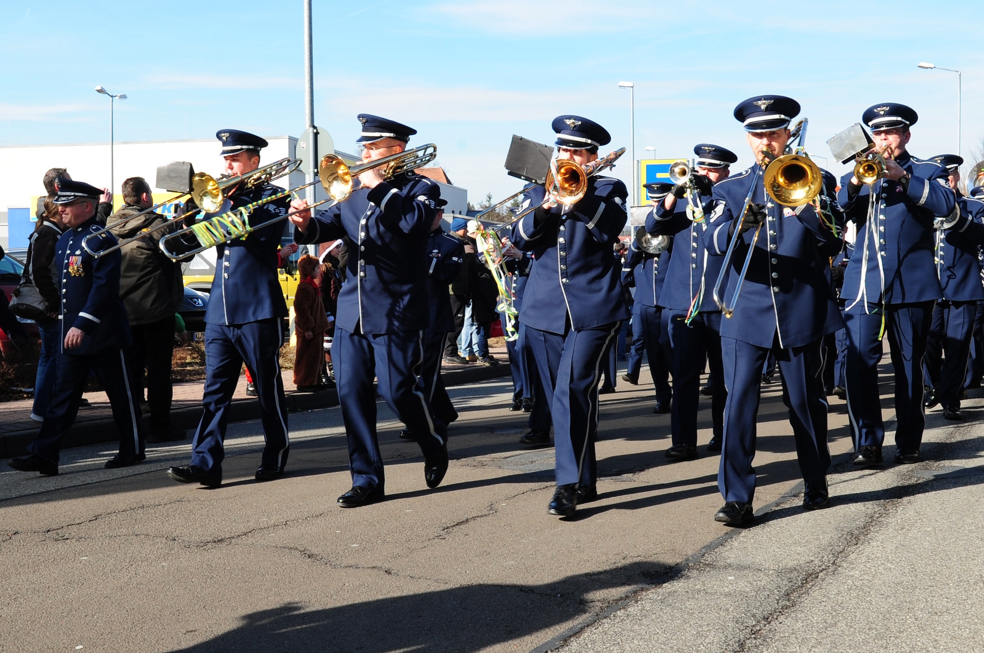 United States Air Forces in Europe Band performs for those in attendance during the annually celebrated Fasching parade, Ramstein Village, Germany, Feb. 21, 2012. This annual event is a pre-Lenten carnival which is celebrated with the donning of wild and fancy costumes to chase away the evil spirits of winter in preparation for spring. (U.S. Air Force photo by Senior Airman Brittany Perry)