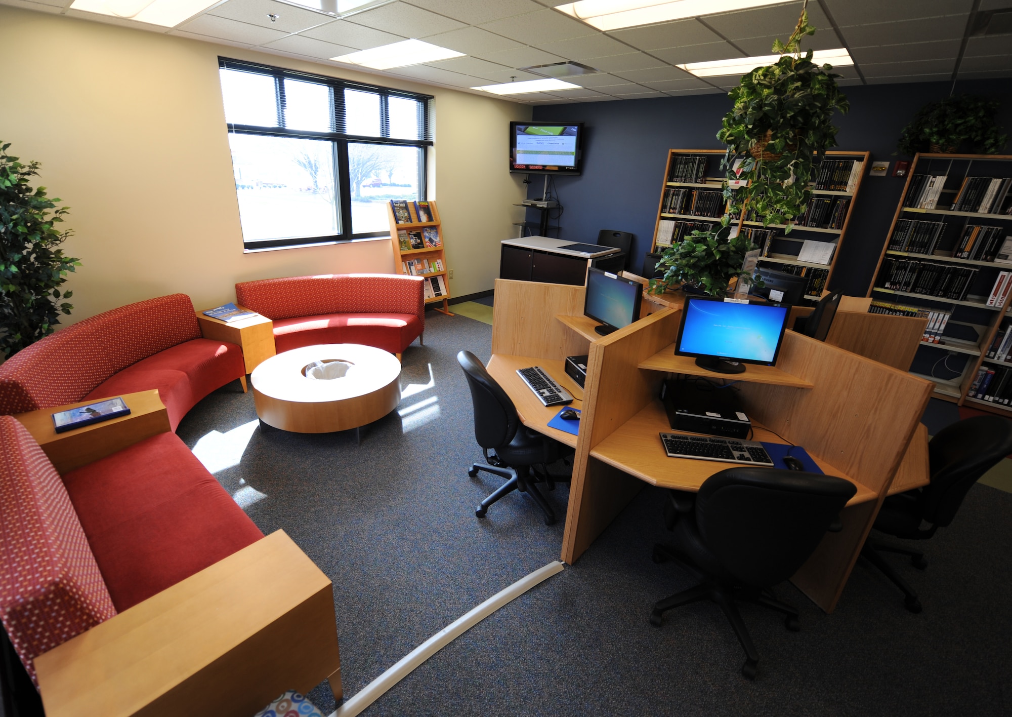 The new Professional Military Education room in the McElveen Library recently opened at Shaw Air Force Base, S.C., Feb. 17, 2012. The PME room is designed to provide Airmen with easy access to McElveen Library's extensive collection of College Level Examination Program, Dantes and other test prep materials. (U.S. Air Force photo by Senior Airman Tabatha McCarthy/Released)
