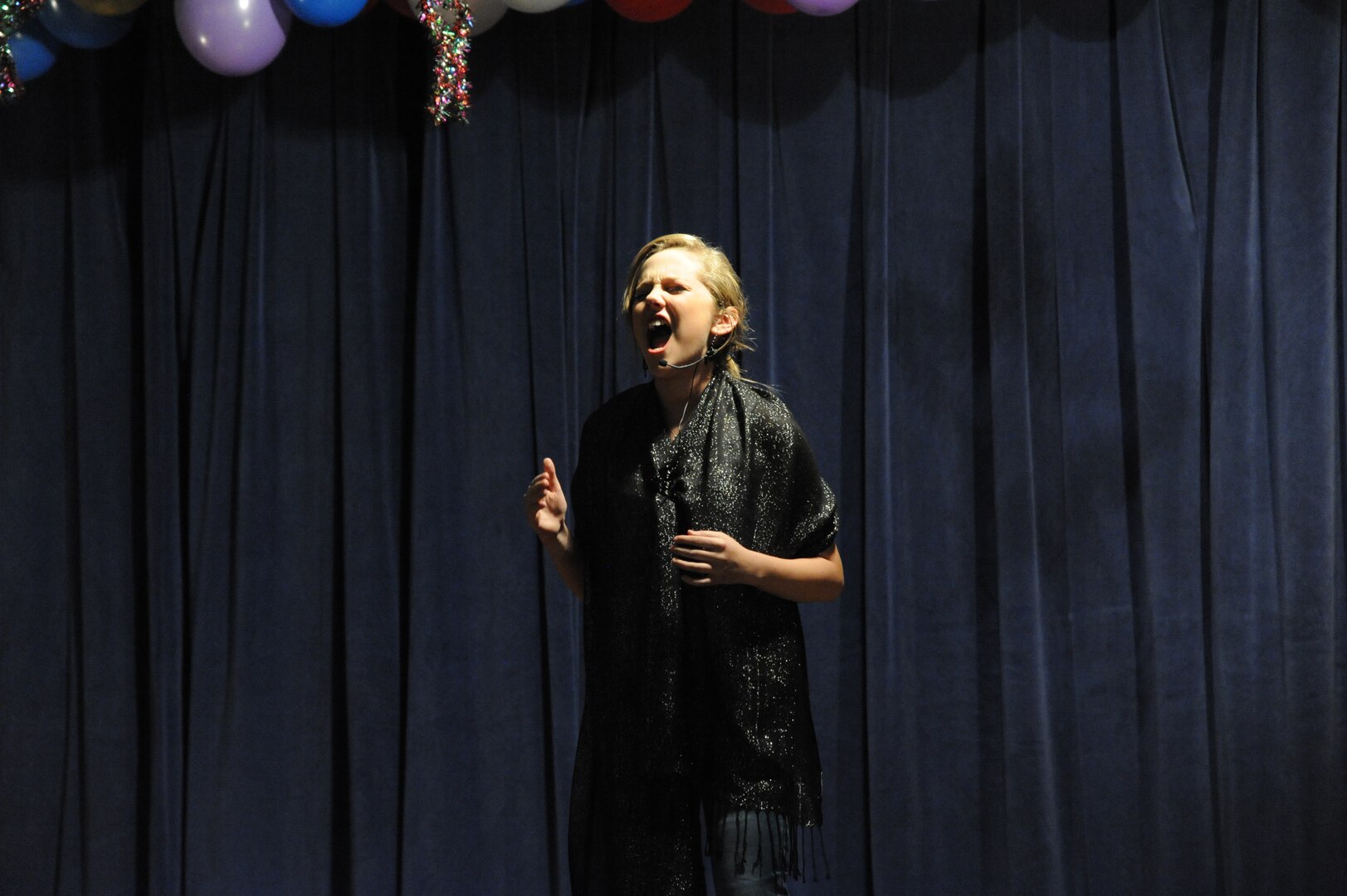 Katryna Marttala, singing “Listen” by Beyonce, placed first in the Pre-Teen Solo category at the You Got Talent Family Teen Talent Contest at the base Airman and Family Readiness Center Feb. 17. (U.S. Air Force photo/Rich McFadden) (released)
