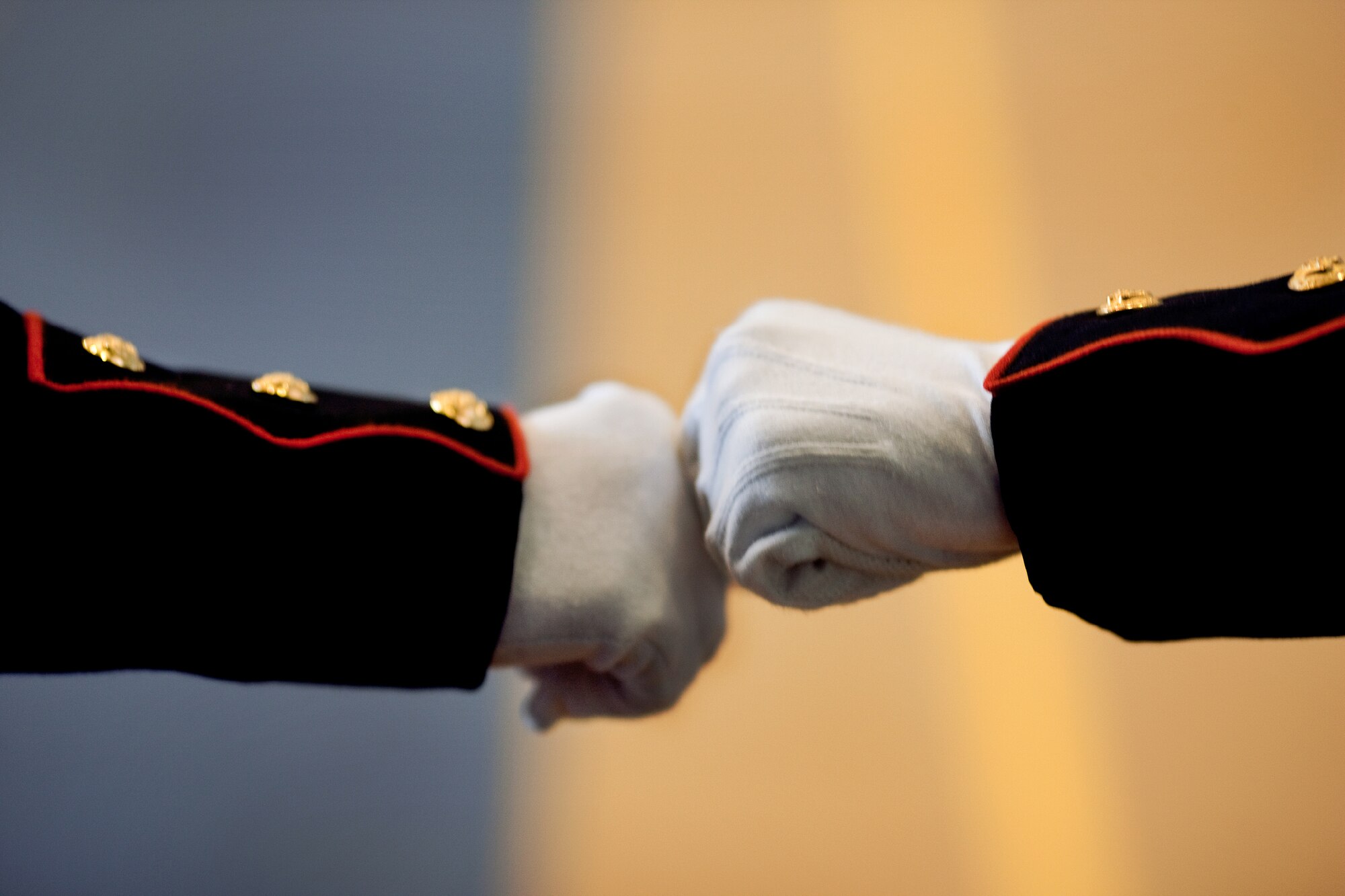 YOKOTA AIR BASE, Japan -- Two Marine Junior Reserve Officers' Training Corps Cadets encourage each other before a performance during the Junior Reserve Officers' Training Corps regional drill meet at Yokota High School, Feb. 18, 2012. Seven, U.S. Department of Defense Dependents High Schools participated in the meet.  (U.S. Air Force photo/Osakabe Yasuo)