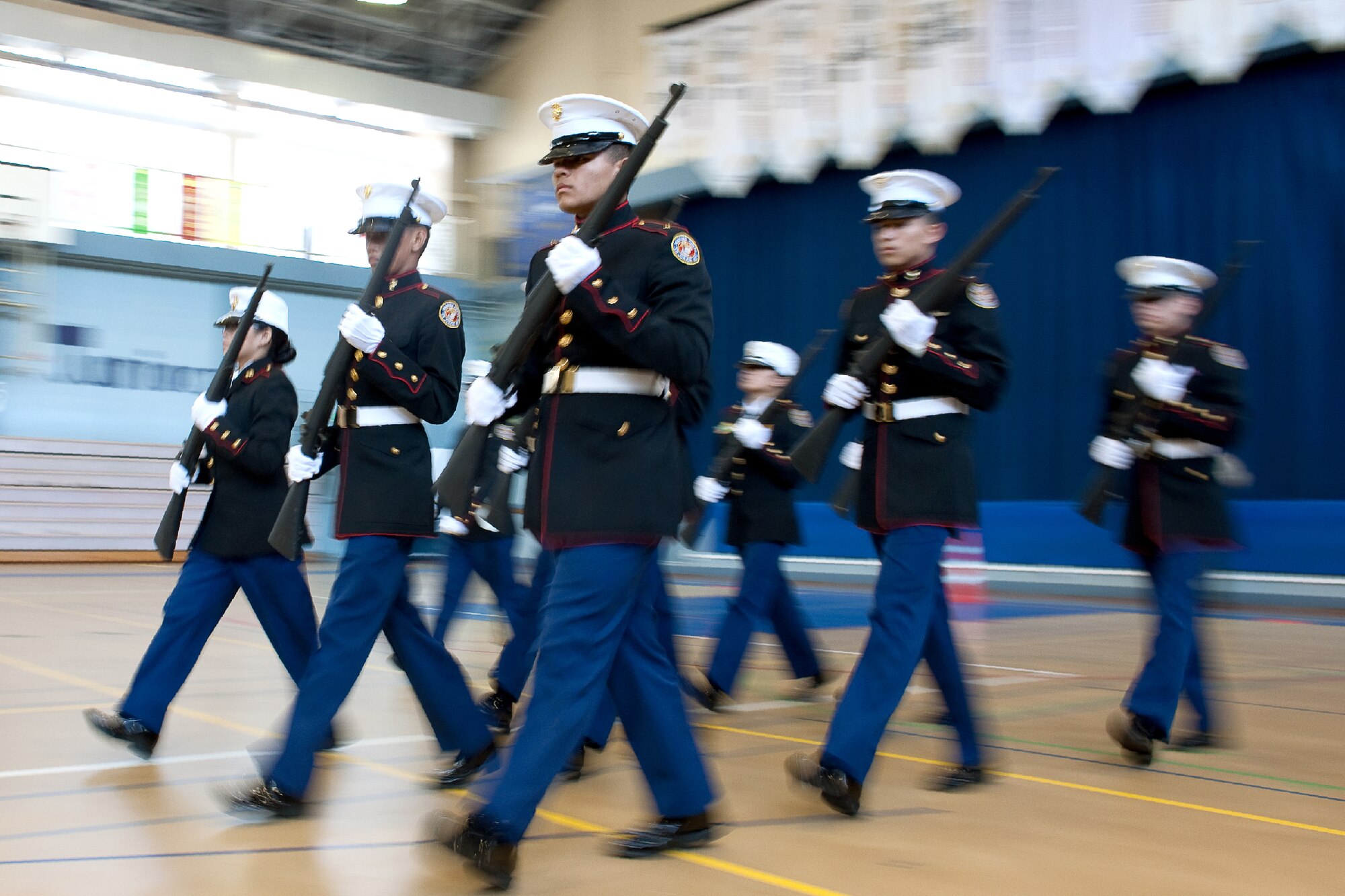 YOKOTA AIR BASE, Japan -- Members from the Matthew C. Perry High School Junior Reserve Officers' Training Corps, Marine Corps Air Station Iwakuni, Japan, perform armed regulation during the regional drill meet at Yokota High School, Japan, Feb. 18, 2012. Seven, U.S. Department of Defense Dependents High Schools participated in the meet. Nile C. Kinnick High School from the Commander Fleet Activities, Yokosuka received 1st place. (U.S. Air Force photo/Osakabe Yasuo)