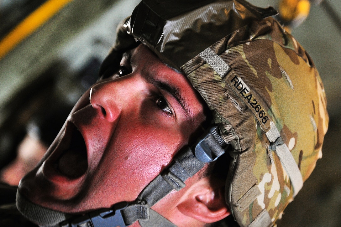 Army Staff Sgt. Matthew Alarcon gives jump instructions during a joint operational access exercise on Pope Field, N.C., Feb. 10, 2012. Alarcon is a jumpmaster assigned to the 82nd Airborne Division's 1st Battalion, 505th Parachute Infantry Regiment, 3rd Brigade Combat Team.