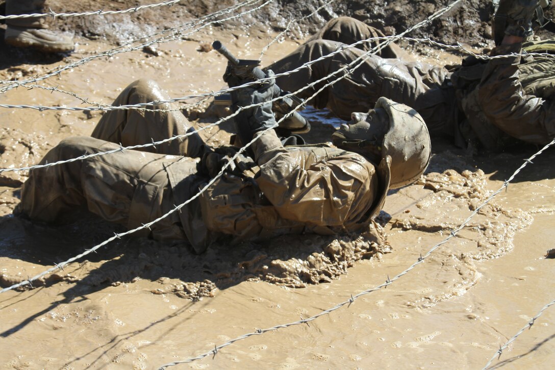 Lance Cpl. Max T. Jensen participates during the crucible with Company M, 3rd Recruit Training Battalion, Feb. 22, after spending more than a year aboard Marine Corps Recruit Depot San Diego. Jensen sustained several injuries, but the most severe being a broken femoral neck. He was told on 10 separate occasions he could go home, but chose to continue recruit training and refused to let his injuries set back his goals.