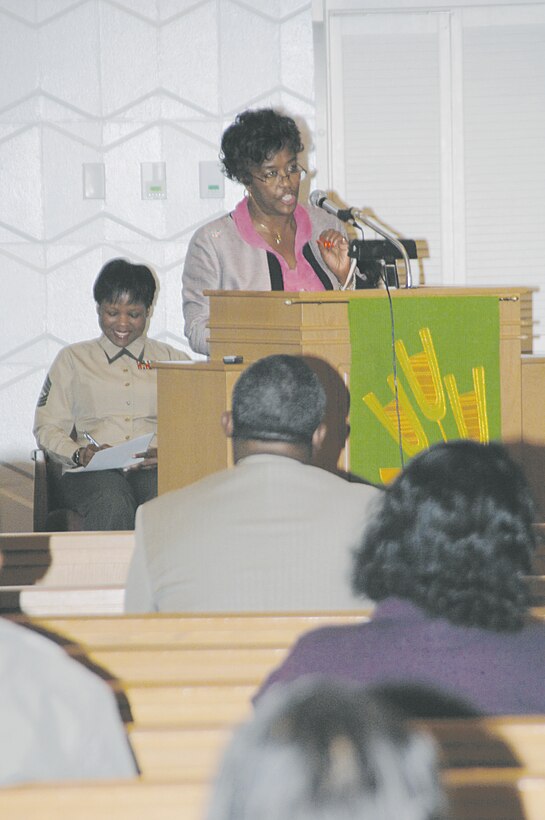 Dorothy Hubbard, Albany’s first female mayor and guest speaker, addresses the audience during the Albany Area Chapter of Blacks in Government and Marine Corps Logistics Base Albany Black History program, held at the Base Chapel, Feb. 16.