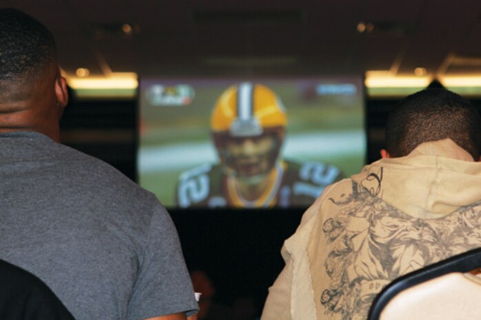Marines, sailors and guests enjoyed watching Super Bowl XLV during the Single Marines Program's party, Feb. 6.