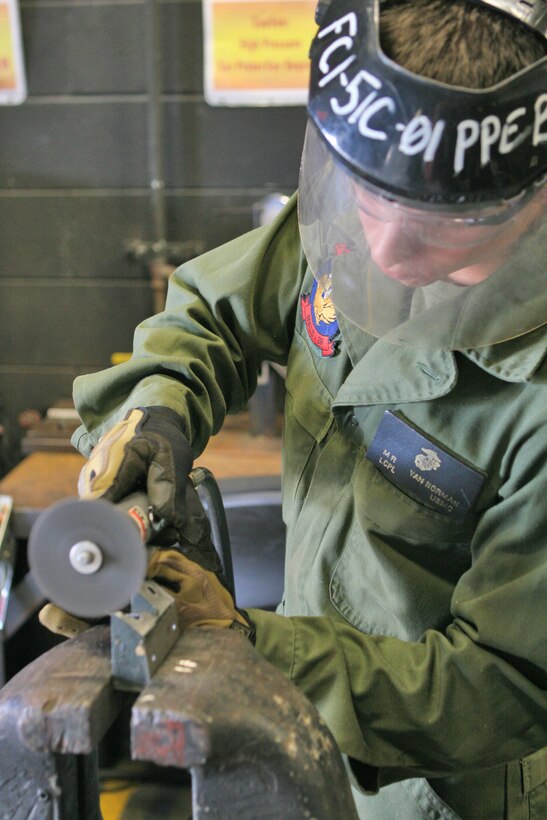 Lance Cpl. Matthew Van Norman, an aircraft welder with Marine Aviation Logistics Squadron 26 works to complete a welding job, May 3.