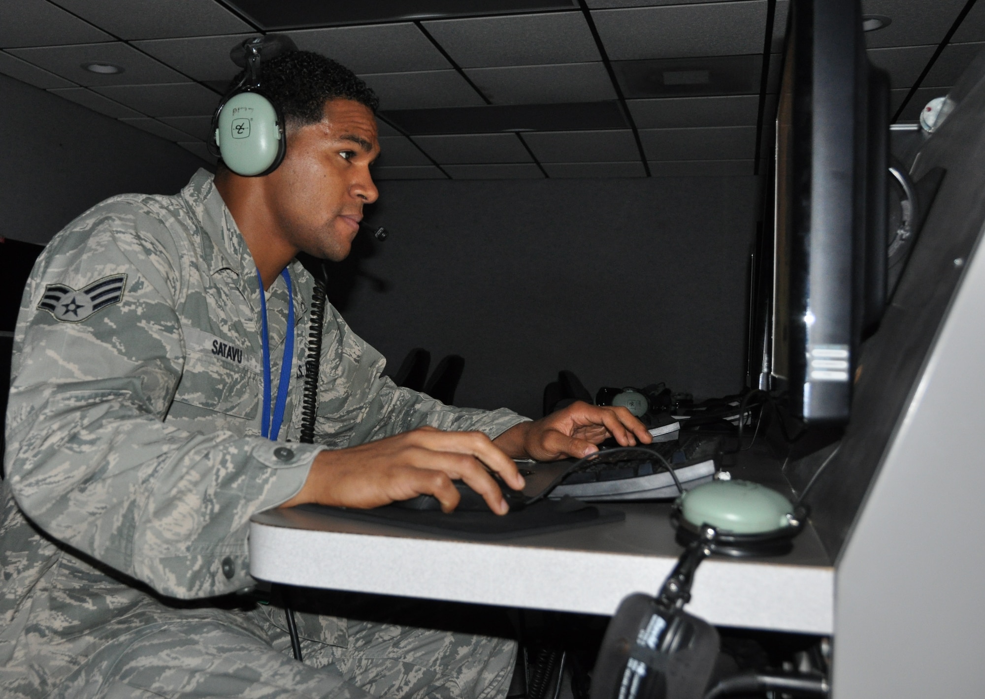 Senior Airman Marcus Satavu, 325th Air Control Squadron, is a pilot simulator for the school house in which he helps to train the Air Battle Managers. He also is the unit fitness program monitor. (U.S. Air Force photo by Senior Airman Rachelle Elsea)