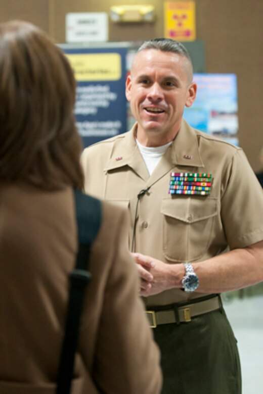Chief Warrant Officer Emiliano DeLeon, Inspector/Instructor with the Marine Corps Reserve Landing Support Equipment Company, speaks with a local media representative at a job fair here, Feb. 23. DeLeon coordinated the job fair that allowed approximately 200 veterans and service members to meet representatives from eight local employers, as well as job counselors and colleges offering veterans programs. The eight represented employers had approximately 300 jobs to offer at the event.