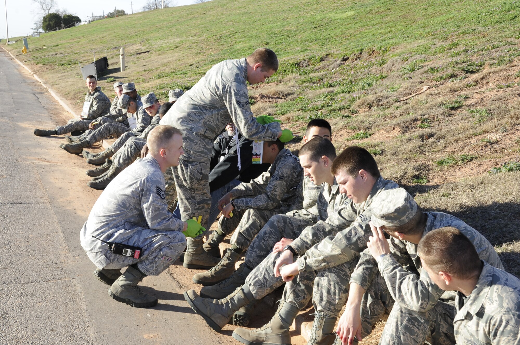 Airmen are treated for mock injuries during a base Major Accident Response Exercise at Sheppard Air Force Base, Texas on Feb. 23, 2012.  The exercise was conducted in preparation for the base's upcoming AETC Compliance Inspection. (U.S. Air Force photo/Frank Carter)
