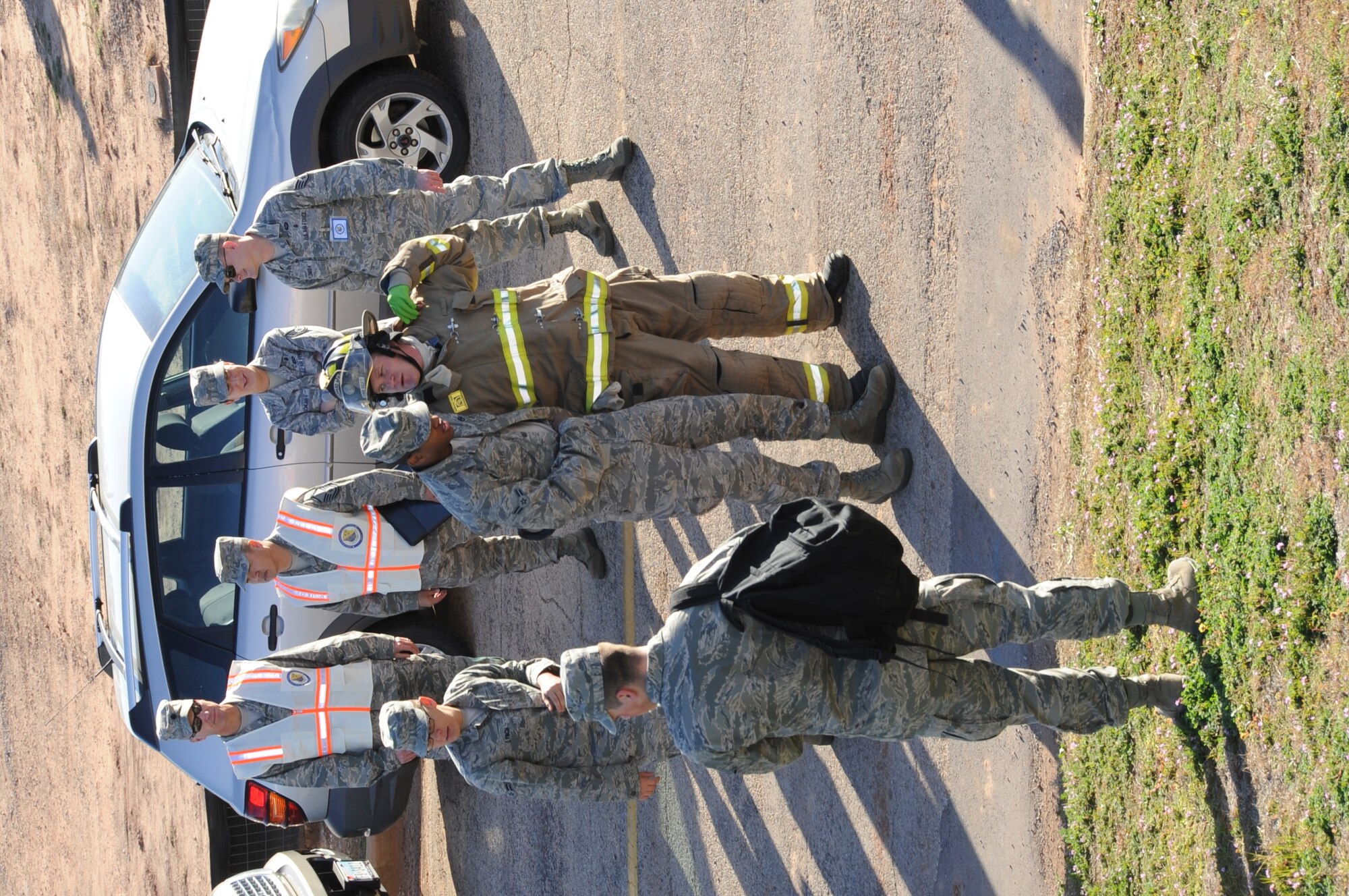 Injured Airmen are helped to safety during a base Major Accident Response Exercise at Sheppard Air Force Base, Texas on Feb. 23, 2012.  The exercise was conducted in preparation for the base's upcoming AETC Compliance Inspection. (U.S. Air Force photo/Frank Carter)