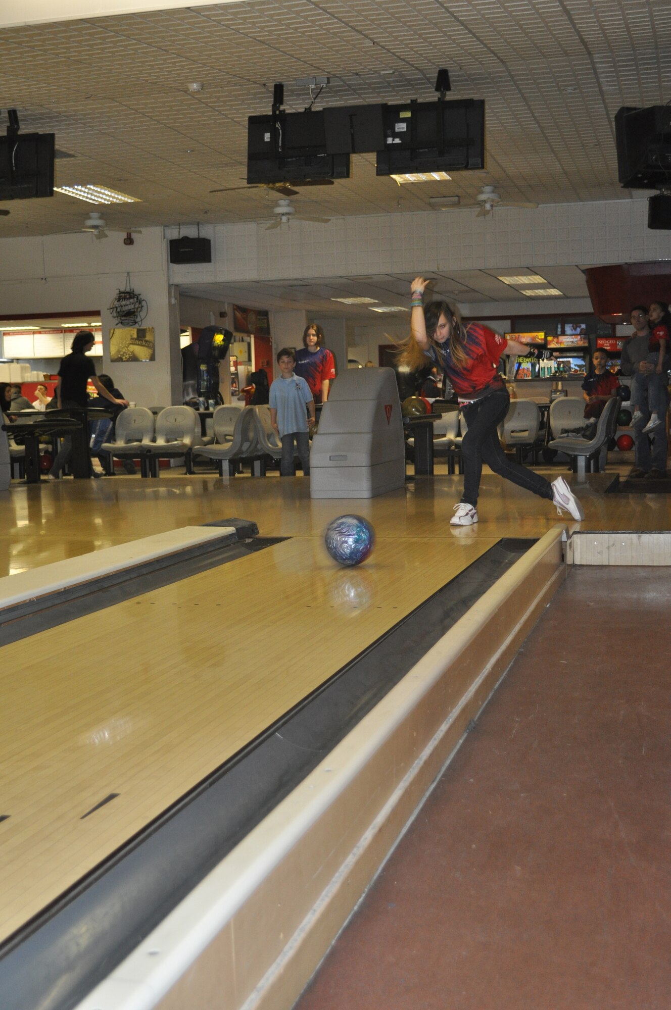 ROYAL AIR FORCE LAKENHEATH, England -- Lori Highlander, 17, Team Lakenheath Youth member bowls during 2012 Pepsi United States Bowling Congress Youth European Zone U.K. Regional Finals at Liberty Lanes, Feb. 11.
This year 90 youth bowlers from Aviano Air Base, Italy and RAFs Alconbury, Coughton, Menwith Hill, and Lakenheath competed for $4,100 in scholarships for the 11-and-under and 12- and-over handicap divisions. (Courtesy Photo)


