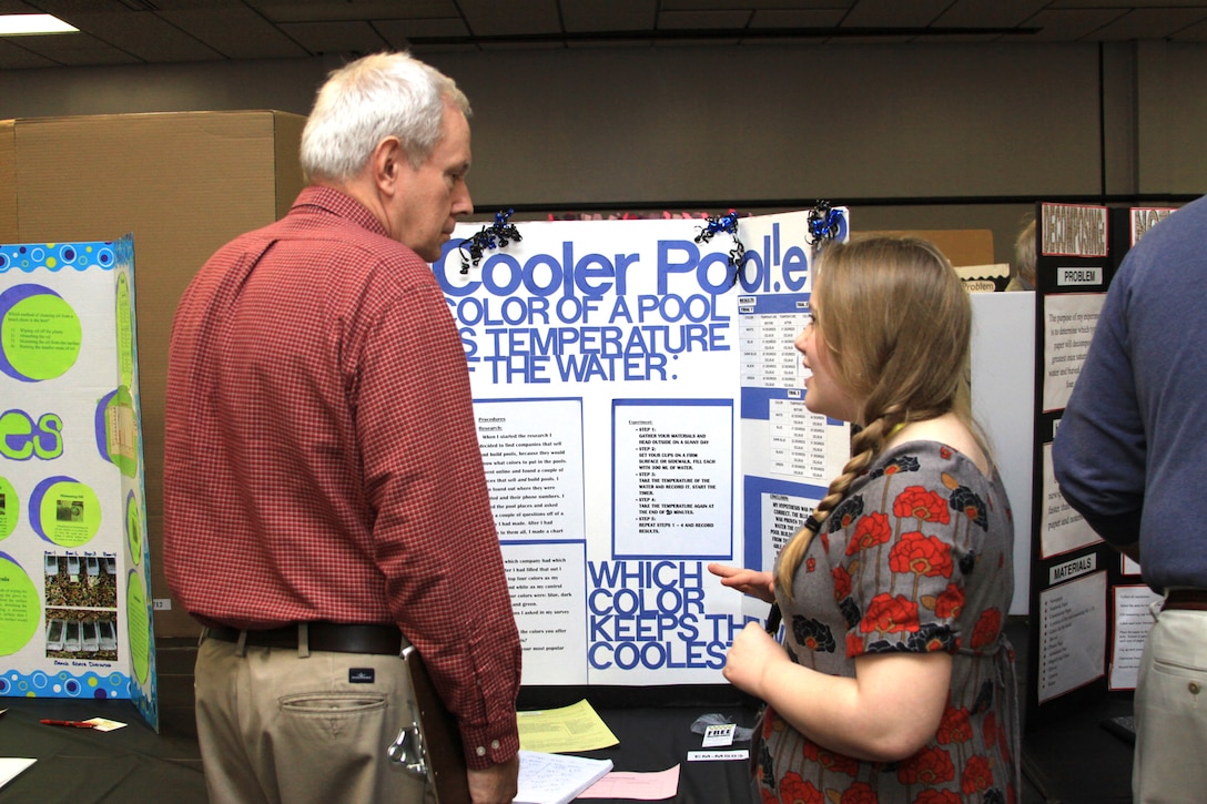 GEORGIA — Joe Hoke, a hydraulic engineer with the U.S. Army Corps of Engineers Savannah District, interviews a student about her science project at the 2012 Georgia Tech Regional Science and Engineering Fair, Feb. 15, 2012. 