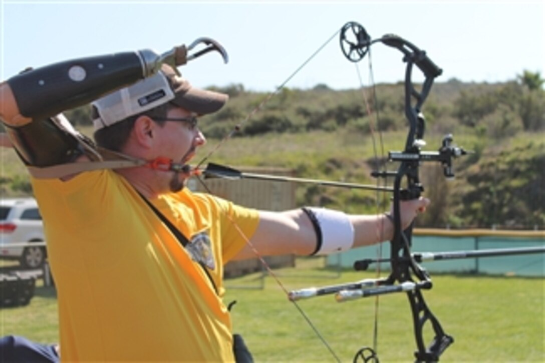 Marine Corps veteran Mark P. OíBrien participates in an archery competition at the 2012 Marine Corps Trials at Camp Pendleton, Calif., on Feb. 18, 2012.  OíBrien was wounded in Ramadi, Iraq, in 2004.  The trials were hosted by the Marine Corps Wounded Warrior Regiment and helped active-duty, reserve, veteran and international Marines focus on strengthening their bodies and building their confidence.  