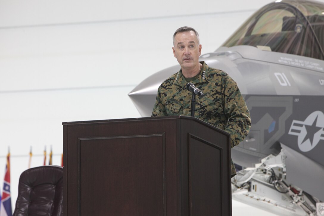 Gen. Joseph F. Dunford Jr., assistant commandant of the Marine Corps, speaks during the F-35B Lightning II Rollout Ceremony at Eglin Air Force Base, Fla., Feb. 24. “For the first time in aviation history, the most lethal characteristics – supersonic speed, radar-evading stealth, extreme agility, and short takeoff vertical landing capability – have been combined in a single platform,” said Dunford.