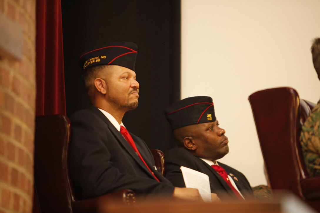 Arnold E. Breckenridge, the secretary of the Cherry Point Chapter of the Montford Point Marine Association and Harold S. Rucker, the vice-president of the Cherry Point Chapter of the Montford Point Marine Association listen to L. Shannon Sabsook, the president of Cherry Point’s Montford Point Marines Association deliver his motivational speech during the Preserving the Legacy memorial program at the MCAS Cherry Point Theater Friday. “Our president is a phenomenal speaker,” said Breckenridge. “He always speaks from his heart. Hopefully, the message that he delivered regarding what the Montford Point Marines had to overcome, will permeate throughout the Marine Corps.”