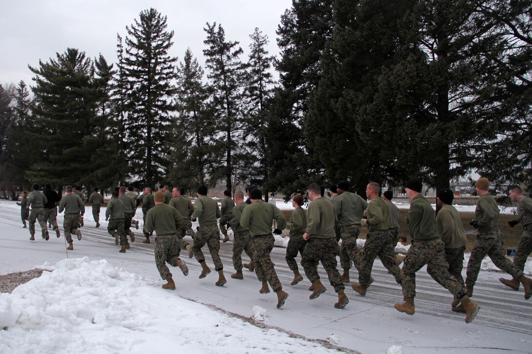 Marines from the Recruiting Station Twin Cities metro offices start their physical training session with a Cross Fit workout Feb 24. For additional imagery from the event, visit www.facebook.com/rstwincities.