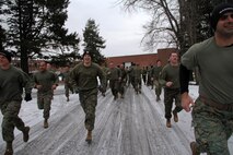 Marines with Recruiting Station Twin Cities' metro offices are all smiles at the start of their Cross Fit workout during an all hands training session Feb. 24. For additional imagery from the event, visit www.facebook.com/rstwincities.