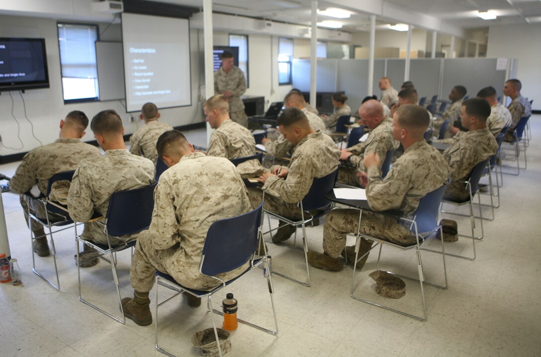 Marines with Combat Logistics Battalion 2, Combat Logistics Regiment 2, 2nd Marine Logistics Group, and 2nd Battalion, 10th Marine Regiment, 2nd Marine Division, participate in a gunner’s course at the Division Training Center aboard Camp Lejeune, N.C., Oct. 26, 2011. The training is a part of pre-deployment training for their upcoming tour in support of International Security Assistance Forces in Helmand province, Afghanistan, next year. (U.S. Marine Corps photo by Pfc. Franklin E. Mercado)