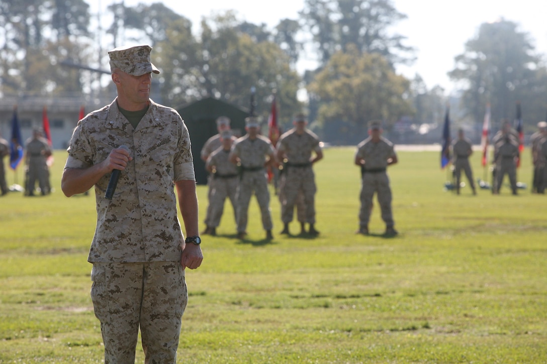 Lt. Col. Carl Cooper, incoming commanding officer for 3rd Battalion 9th Marine Regiment, 2nd Marine Division, speaks to the audience attending the change of command ceremony, Oct. 21. During the ceremony, 3/9 bid farewell to Lt. Col. David Hudspeth and welcomed Cooper.