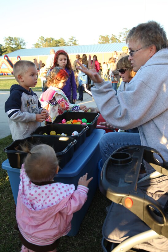 Students claim their prizes during a game at Johnson Primary School's Fall Festival aboard Marine Corps Base Camp Lejeune, Oct. 20.