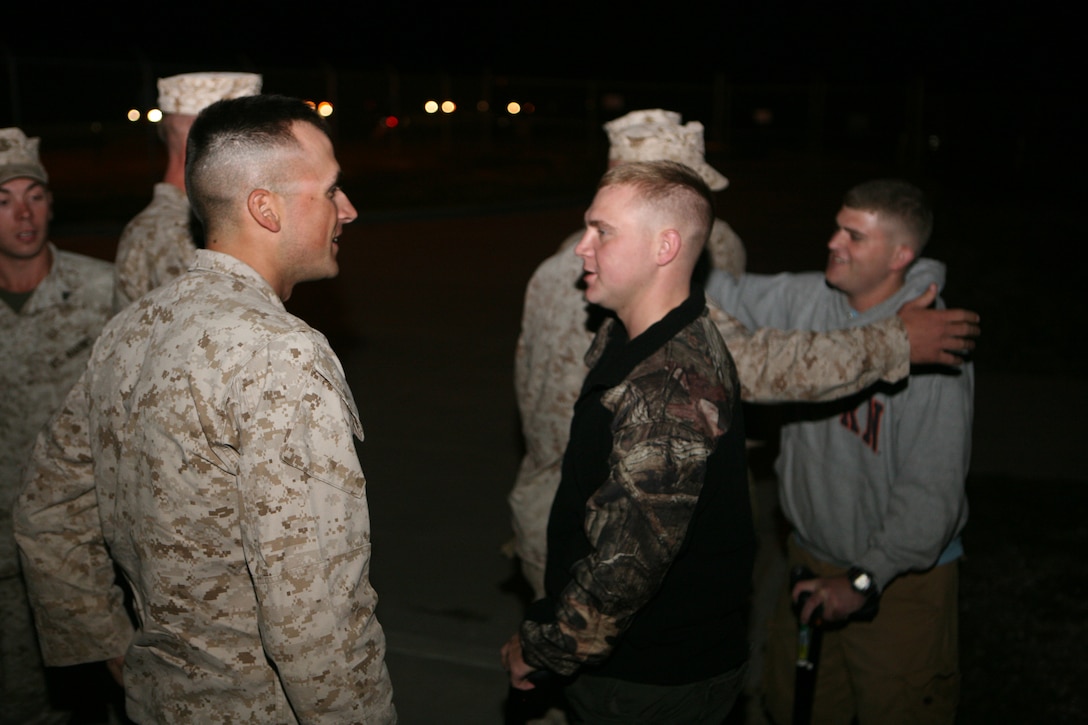 Wounded Marines who were part of 2nd Combat Engineer Battalion, 2nd Marine Division, and came home early due to injuries sustained while deployed welcome home Marines from the same unit as they return from their seven month deployment. 2nd CEB returned from a seven month deployment Monday.