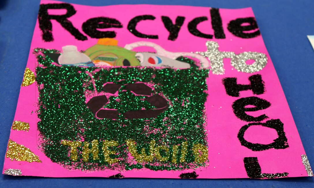 The winning entry of the teen division of the Energy Awareness Month poster contest. The poster reads "RECYCLE TO HEAL". (Official U.S. Marine Corps photo by Pfc. Jackeline M. Perez Rivera)