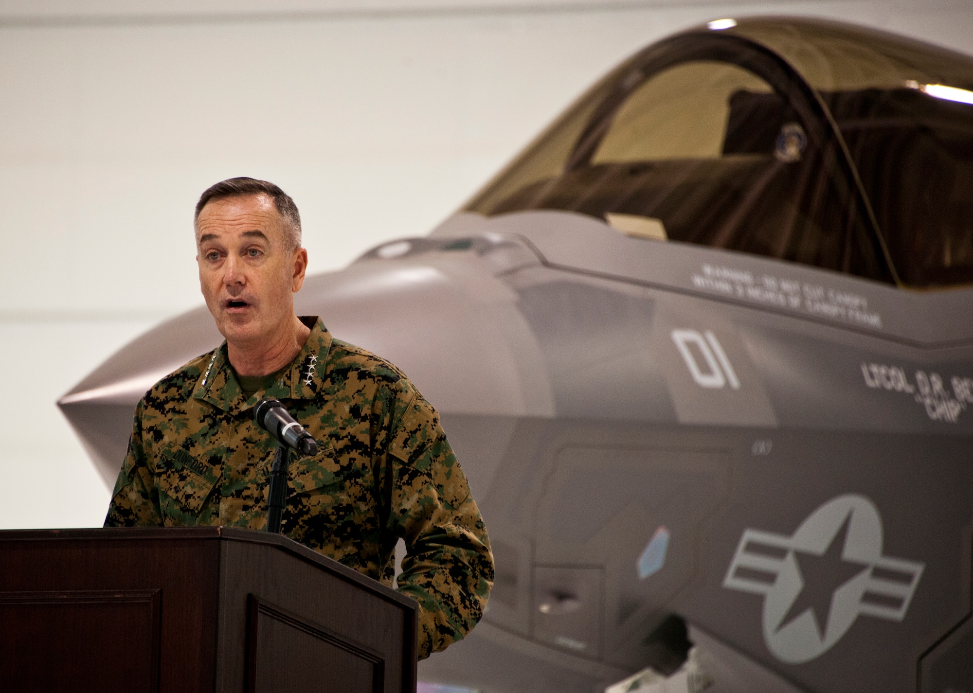 Assistant Commandant of the Marine Corps. Gen. Joseph Dunford speaks at the Marine Corps F-35B Lightning II roll out ceremony Feb. 24 at Eglin Air Force Base, Fla.  (U.S. Air Force photo/Samuel King Jr.)