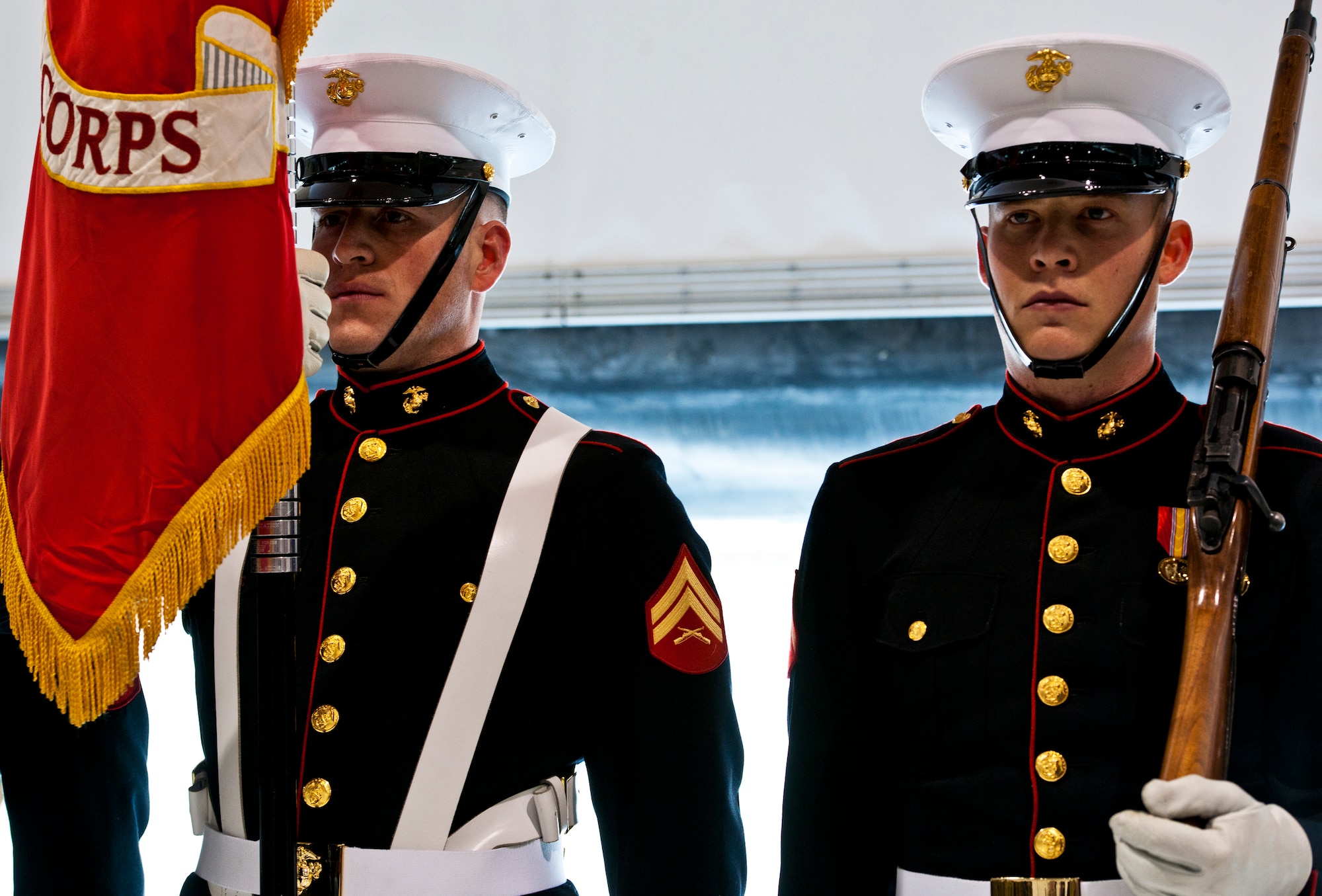 Marine Corps color guard members stand by during the USMC F-35B Lightning II roll out ceremony Feb. 24 at Eglin Air Force Base, Fla.  (U.S. Air Force photo/Samuel King Jr.)