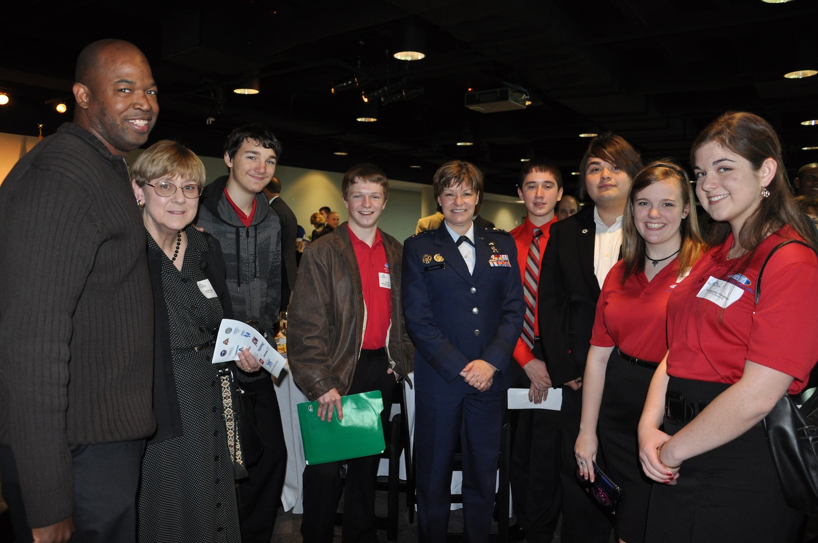 SAN ANTONIO -- Members of the CyberPatriot team from the Information Technology Security Academy stop for a picture with Maj. Gen. Suzanne Vautrinot, 24th Air Force commander, after attending the 2nd Annual Mayor's Cyber Cup at the Venues at Valero here Feb. 18. The Mayor's Cyber Cup luncheon recognized the high school team in San Antonio that has performed the best in the national CyberPatriot competition as well as the thirty-six high school teams in San Antonio that have participated in the competition. (U.S. Air Force photo by Lt. Col. Cynthia East)