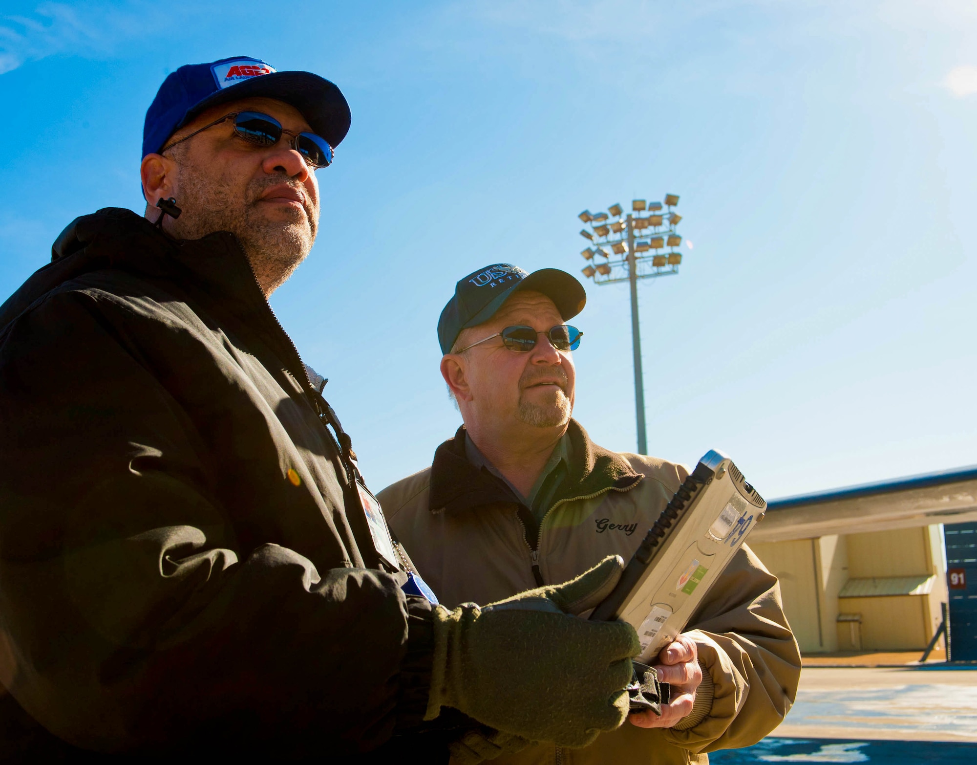 Lanny Harris, (left) 28th Maintenance Squadron, Air Force engineering technical services weapon systems technician, and Garry Cummings, 28th MSXS AFETS crew chief, prepare to inspect a B-1 for systems malfunctions during maintenance on Ellsworth Air Force Base, S.D., Feb. 16, 2012. Harris and Cummings review technical data, work orders, and aircraft maintenance procedures to evaluate the efficiency of maintenance operations. (U.S. Air Force photo by Airman 1st Class Zachary Hada/Released) 