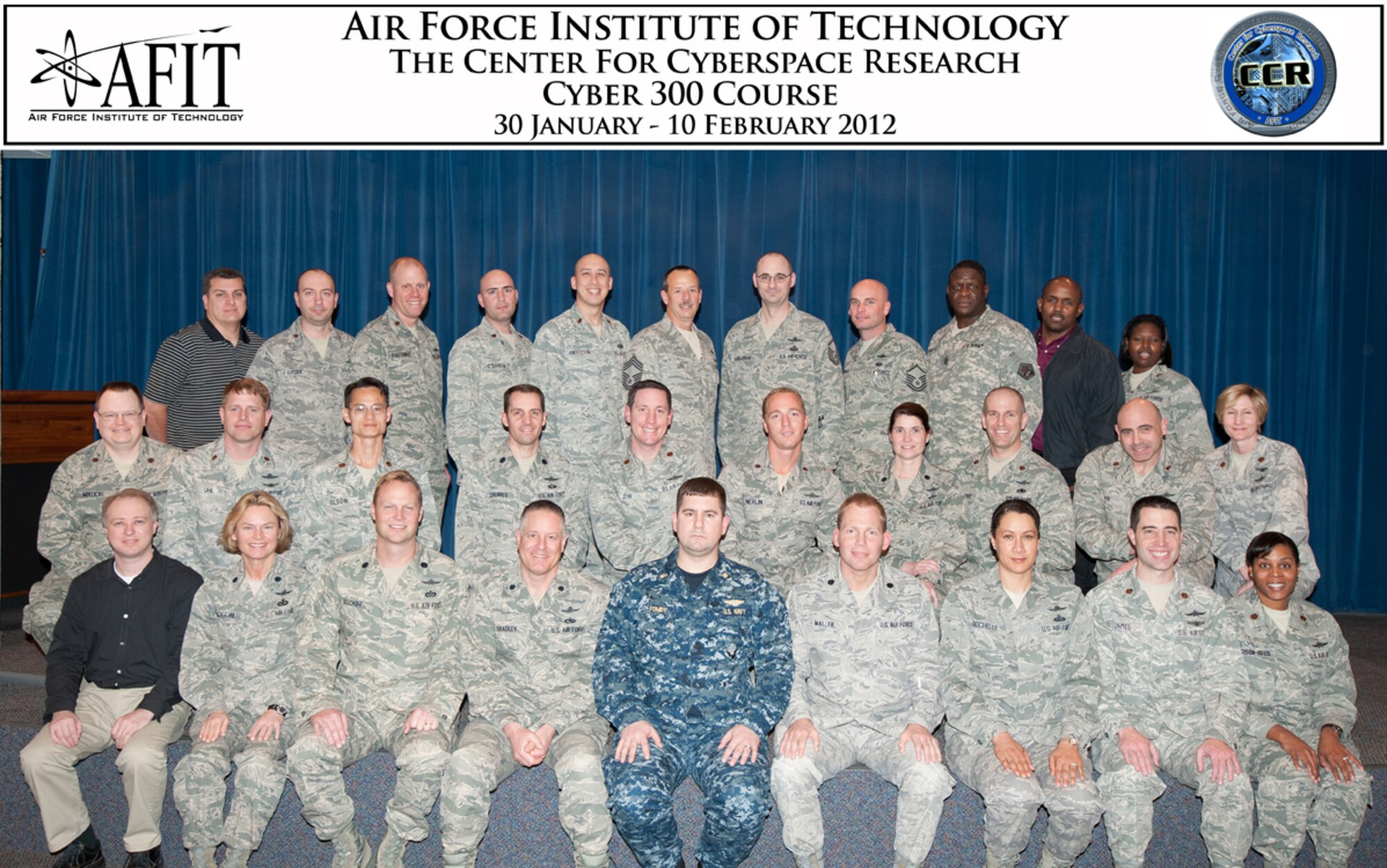 Lt. Cmdr. Matthew R. Fomby, U.S. Navy, is seated first row center, as Cyber 300 class leader. He is the first individual to graduate from both the Cyber 200 and the Cyber 300 professional Continuing Education courses conducted at the Air Force Institute of Technology.