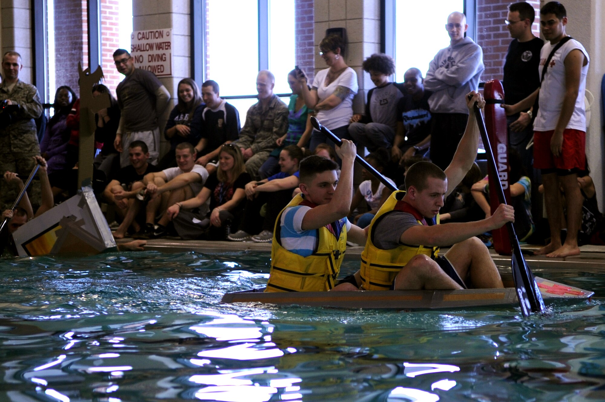 Members from the 319th Medical Group lead the way during their run at the Frosty Sailor Boat Race at the annual Winter Bash on Grand Forks Air Force Base, N.D., on Feb 23, 2012. (U.S. Air Force photo by Staff Sgt. Amanda N. Grabiec)