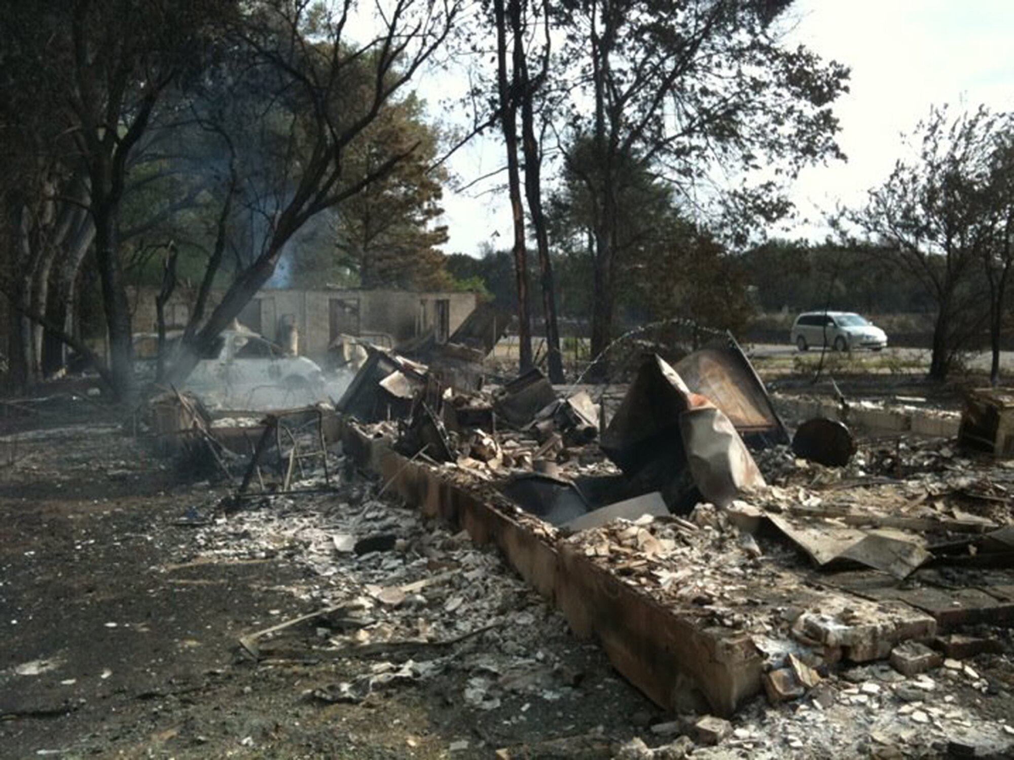The remains of Annette Cook’s house in Butler County, Kan., after a 100-pound propane tank rocketed into it and exploded Aug. 23, 2011. Cook posted this photo online where Alaska Air National Guard Tech. Sgt. Ricky Ramos, from Clear Air Force Station, saw it and was spurred into action to help her family. (Courtesy photo/Annette Cook)