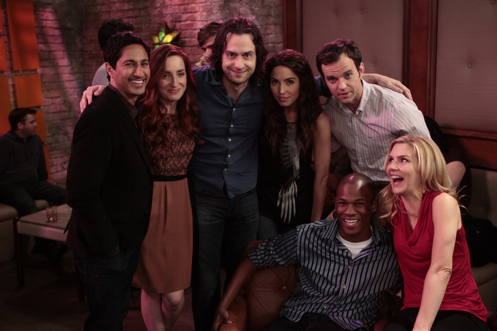 Airman 1st Class Marcus McGinnis hangs out on the set with "Whitney" cast members Maulik Pancholy, Zoe Lister Jones, Chris D'Elia, Whitney Cummings, Dan O'Brien and Rhea Seehorn Feb. 22, 2012, during taping in Studio City, Calif. McGinnis is knowledge operations manager assigned to the 30th Operations Group Command Staff at Vandenberg Air Force Base, Calif. (U.S. Air Force photo courtesy of Chris Haston/NBC)