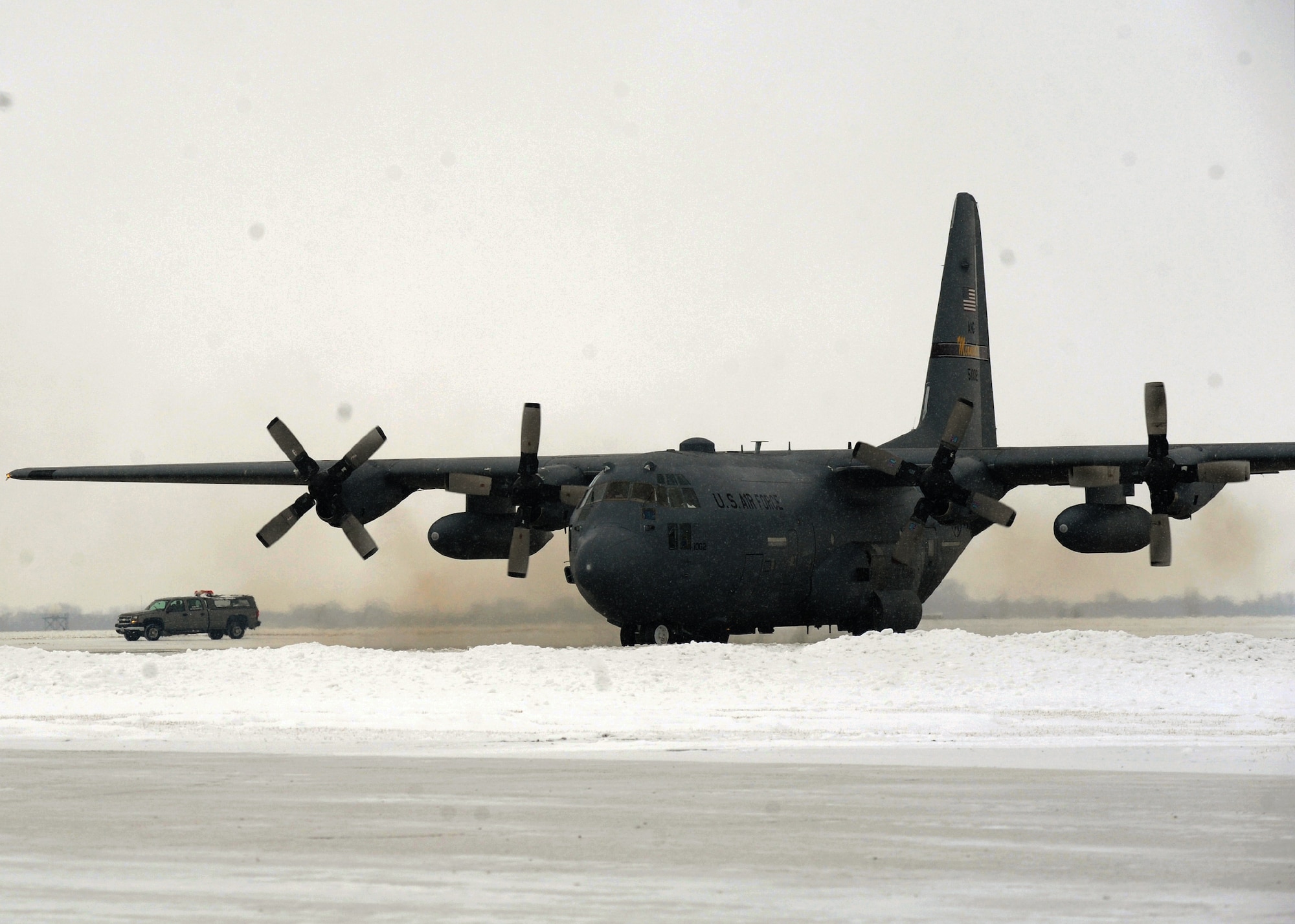 A C-130 Hercules from the 109th Airlift Squadron, Minneapolis Air National Guard, arrives Feb. 22, 2012, to Grand Forks Air Force Base, N.D. The arrival of the aircraft allowed Airmen from the 319th Logistics Readiness Squadron to take part in training scenarios designed to help them develop their skills and gain more experience on correctly loading and unloading cargo on and off live aircraft.  (U.S. Air Force photo/Airman 1st Class Xavier Navarro)