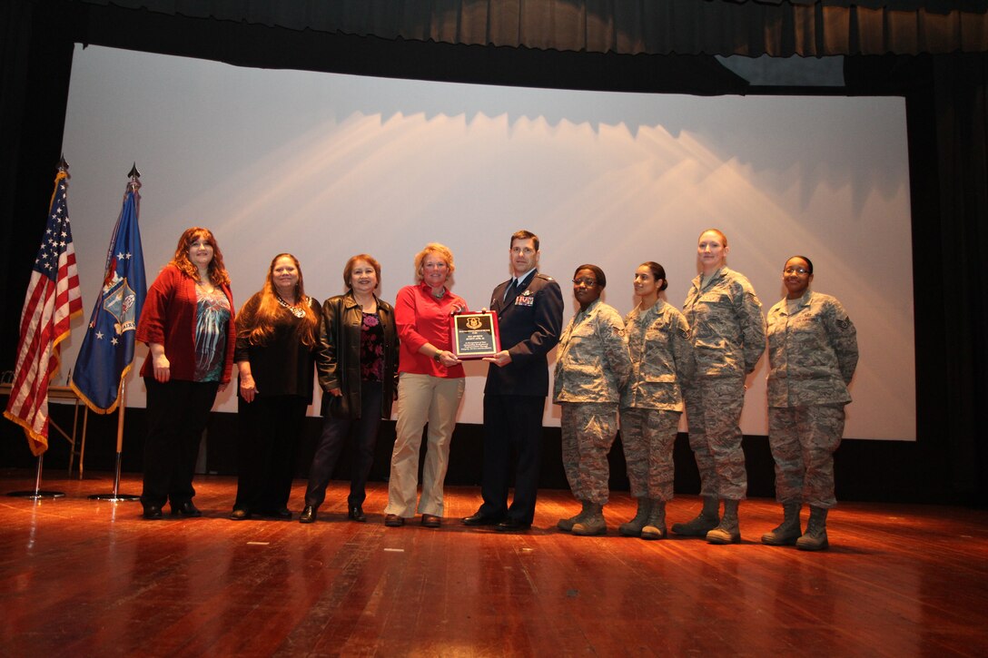 The 932nd Airlift Wing finance office was presented the 2011 Air Force Reserve Command Financial Services Office of the Year award by the commander of the Illinois wing, Col. Albert Lupenski, at an awards ceremony in the theater. (U.S. Air Force photo/Tech. Sgt. Chris Parr)