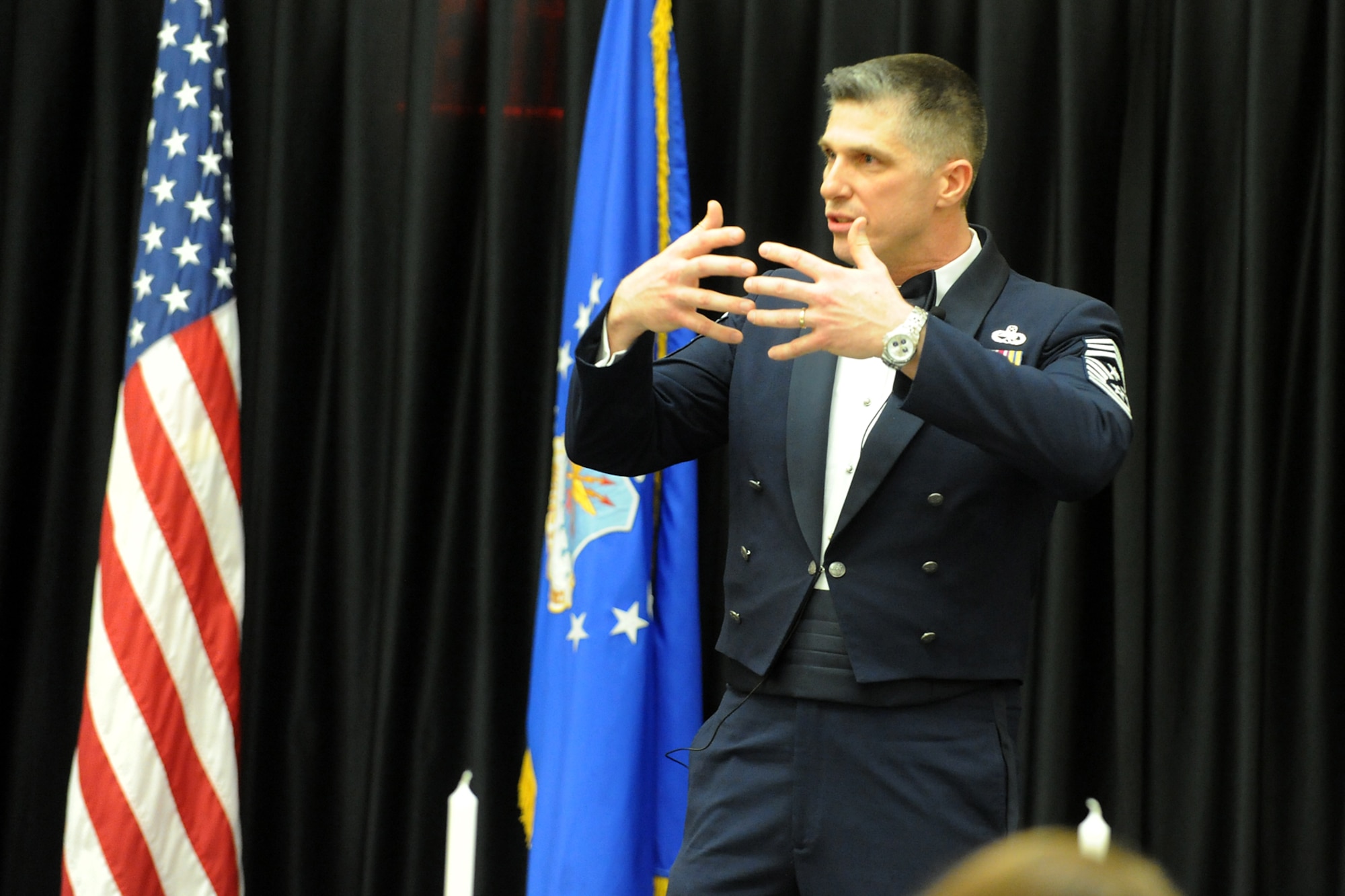 Chief Master Sgt. Eric Jaren, AFMC command chief, explains to new Hill chief master sergeants the importance of integrity, relationships and perspective at a ceremony noting their promotion to chief. (U.S Air Force photo by Alex Lloyd)