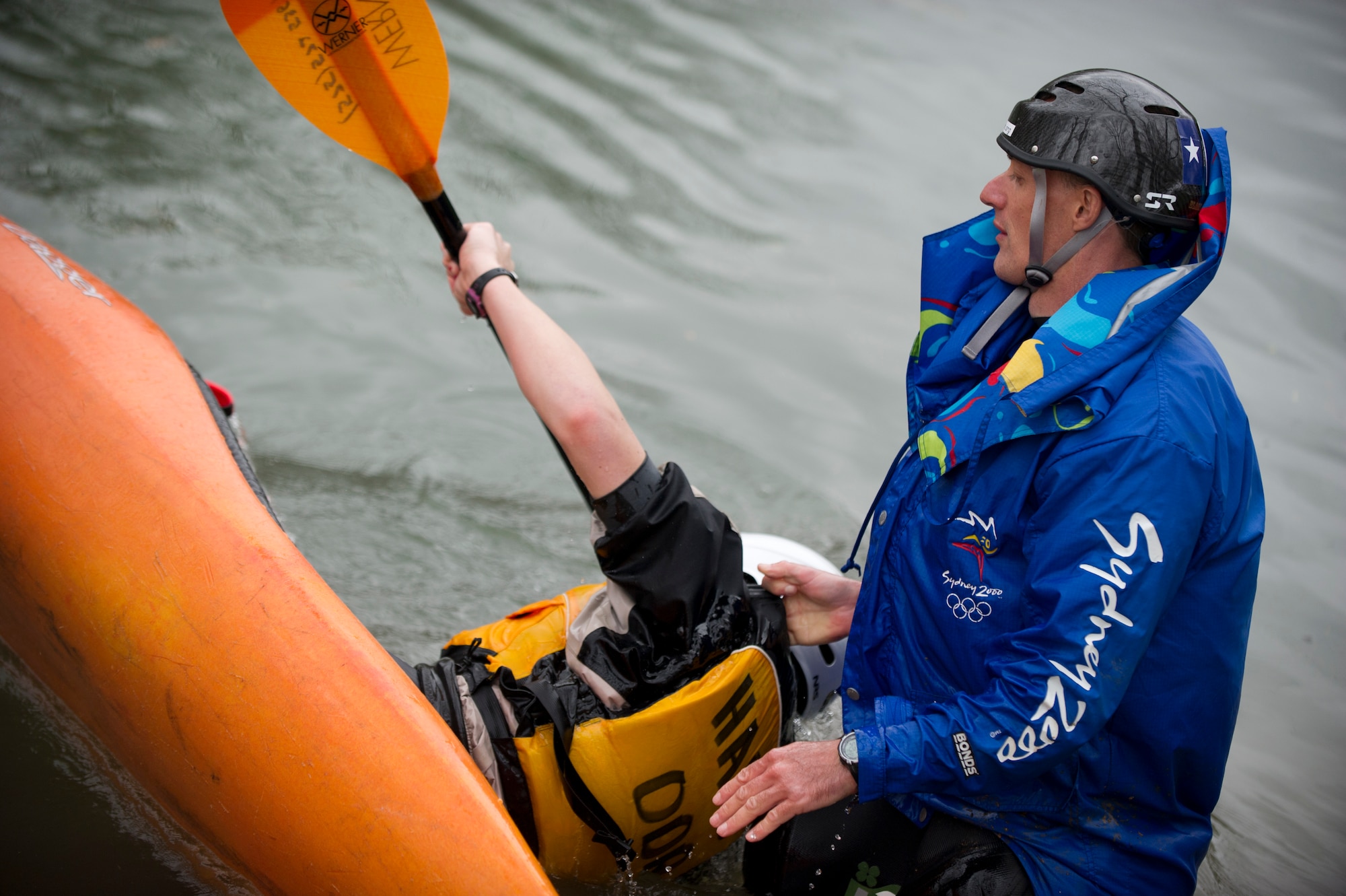 SAN MARCOS, Texas –- Ben Kvanli instructs Kelley Liddicoet, an Air Force spouse, on the basics of rolling a kayak here Feb. 18. Rolling was one the primary skills learned by Airmen a spouse and a civilian participating in Outdoor Recreation’s kayaking trip to San Marcos. Knowing how to roll allows paddlers to take on more challenging rapids without the fear of flipping and not being able to get upright. Each Airman, spouse and civilian and spouse on the trip walked away with a better understanding of both how to manage themselves on a white-water rapid and how to cope through the stress of work in a healthy way. (U.S. Air Force photo by Airman 1st Class Daniel E. Liddicoet/Released)

