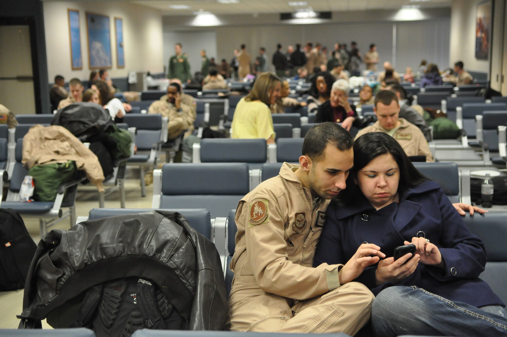 Staff Sgt. Ricardo Sanchez, 10th Airlift Squadron loadmaster, spends time with his wife before deploying in support of Operations Enduring Freedom and New Dawn Feb. 23, 2012, at Joint Base Lewis-McChord, Wash. More than 90 Airmen from the 62nd Airlift Wing's 10th AS departed for a 75-day deployment to the Middle East. They are accompanied by Airmen from the 446th AW and others from Elmendorf Air Force Base, Alaska, and Joint Base Pearl Harbor-Hickam, Hawaii. (U.S. Air Force photo/Airman 1st Class Leah Young)