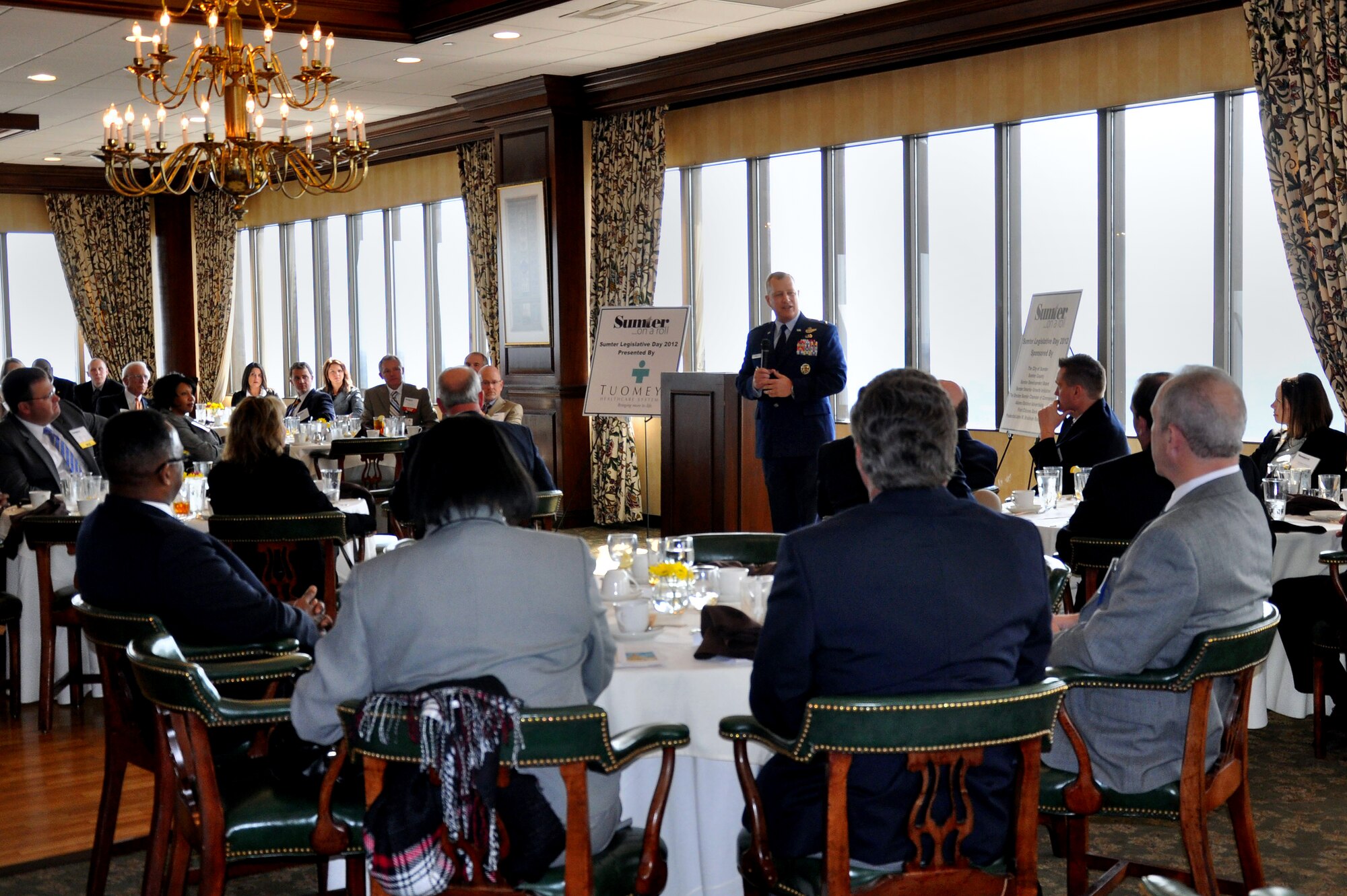 U.S. Air Force Maj. Gen. Lawrence Wells, 9th Air Force commander, (center), discuses Shaw's positive effects on the economy during his attendance at the Sumter Legislative Day 2012 conference, Feb. 22, at the S.C. State House, Columbia, S.C. (U.S. Air Force photo by 1st Lt. Ann Blodzinski/Released) 

