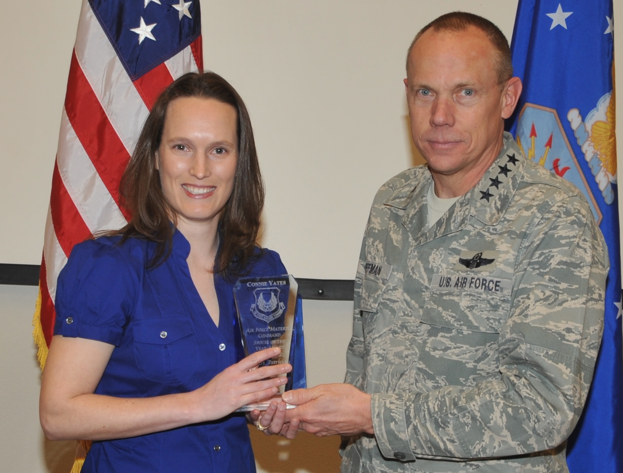 KIRTLAND AFB, N.M. -- Gen. Donald J. Hoffman, commander of Air Force Materiel Command, right, presented the AFMC Connie Yates Spouse of the Year Award to Patricia Sulham during his Feb. 16 visit to Kirtland AFB. (Photo by Todd Berenger)