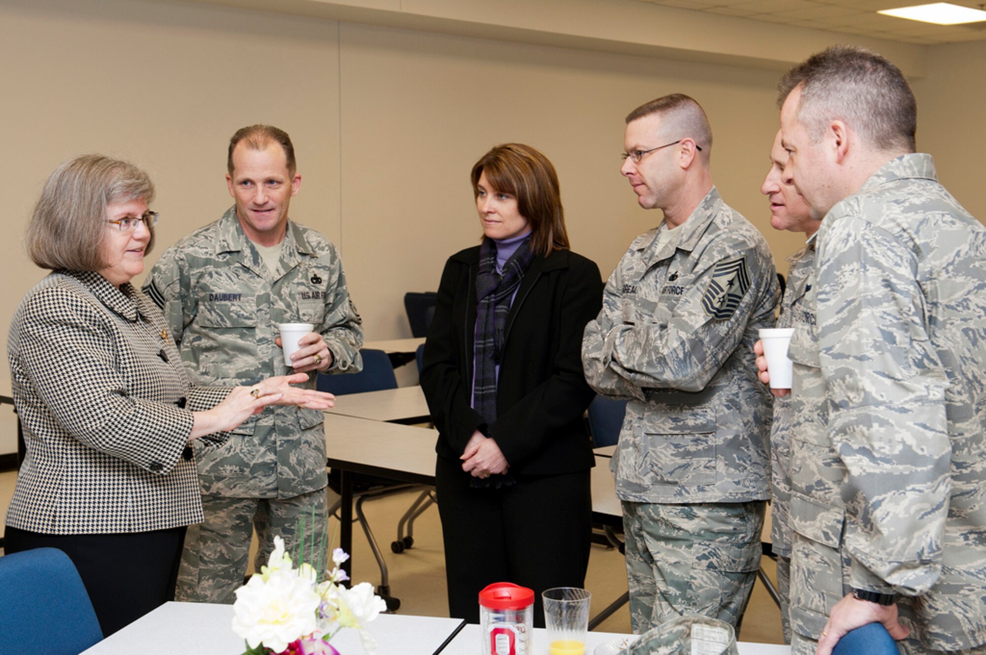Holly Petraeus, New Consumer Financial Protection Bureau assistant director, interacts with joint base leaders during the meet and greet Feb. 22 at the Timmerman Center here. Petraeus educated base members during a speaking engagement highlighting Military Saves Week. (U.S. Air Force photo by Russ Meseroll/Released)