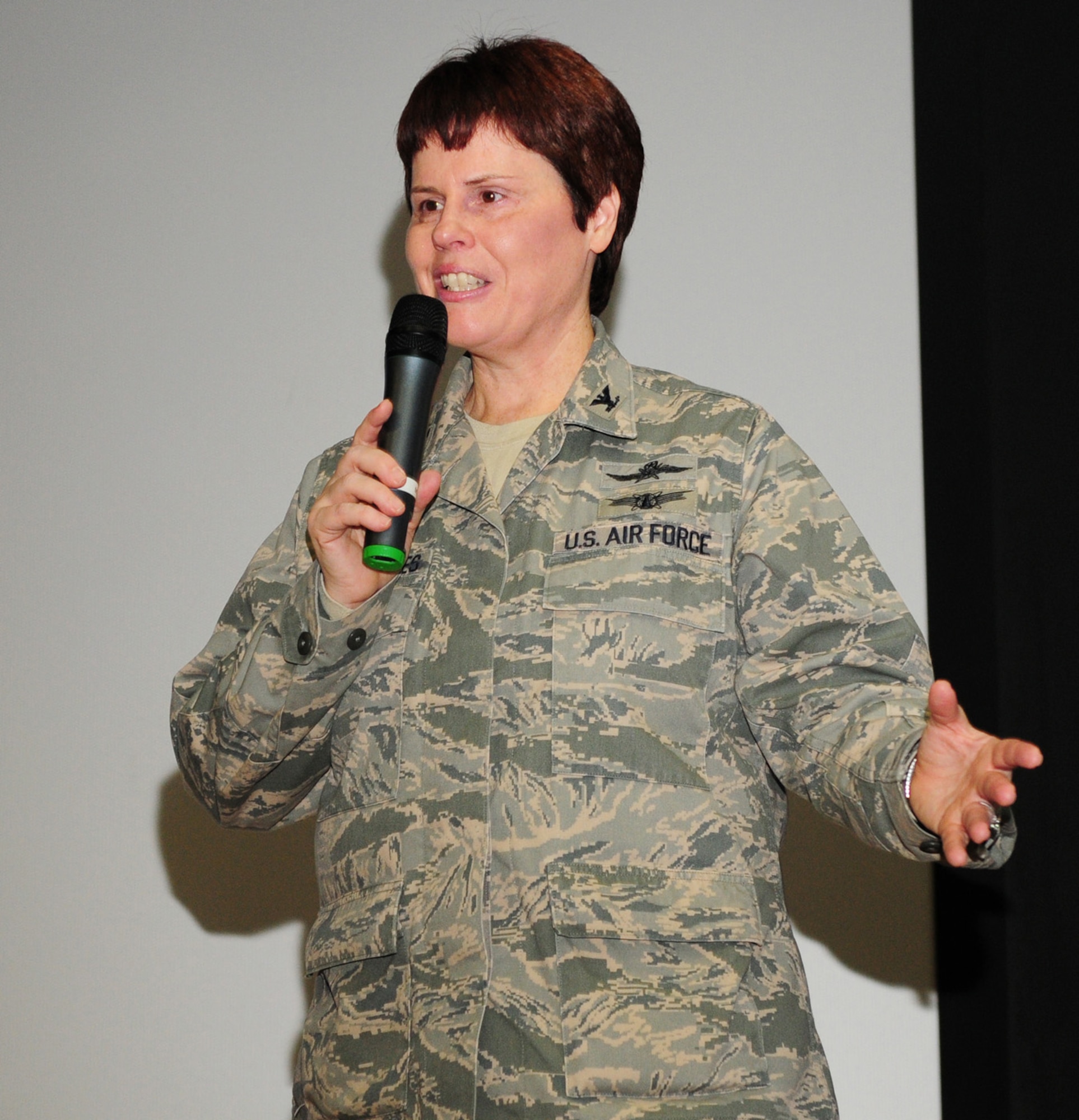 RAF MILDENHALL, England -- Col. Nancy P. Reeves-Flores, U.S. Air Forces in Europe director of communications, speaks to Team Mildenhall and Liberty Wing communications and cyber specialists at the base theater here Feb. 16, 2012. She was on a tour of USAFE bases in England and explained that it's her job to set command cyber policy and direction, and to make sure each wing has the people and resources they need to do their job. (U.S. Air Force photo/Karen Abeyasekere)